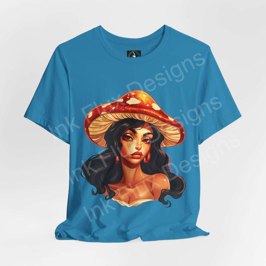 Trippy graphic tee featuring a bold, psychedelic illustration of a woman wearing a mushroom hat on a blue unisex shirt by Bella+Canvas.
