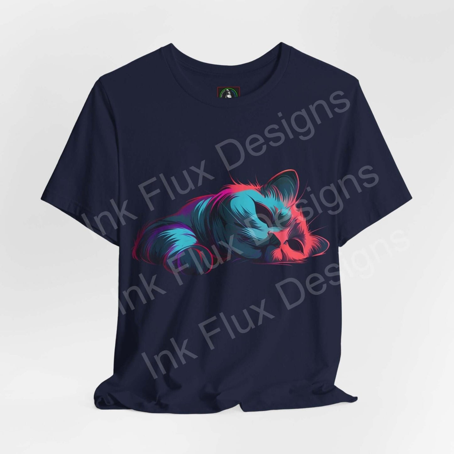 Navy unisex T-shirt featuring a vibrant graphic of a sleeping cat in colorful, stylized art, from Bella+Canvas, ideal for cat lovers and graphic tee enthusiasts.