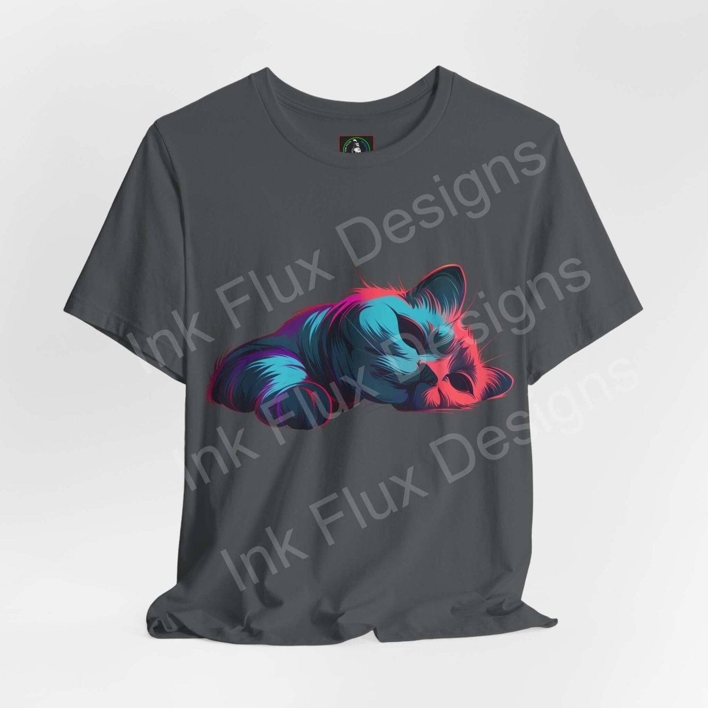 Unisex charcoal gray T-shirt featuring a vibrant graphic of a sleeping cat in blue and pink, from Bella+Canvas.