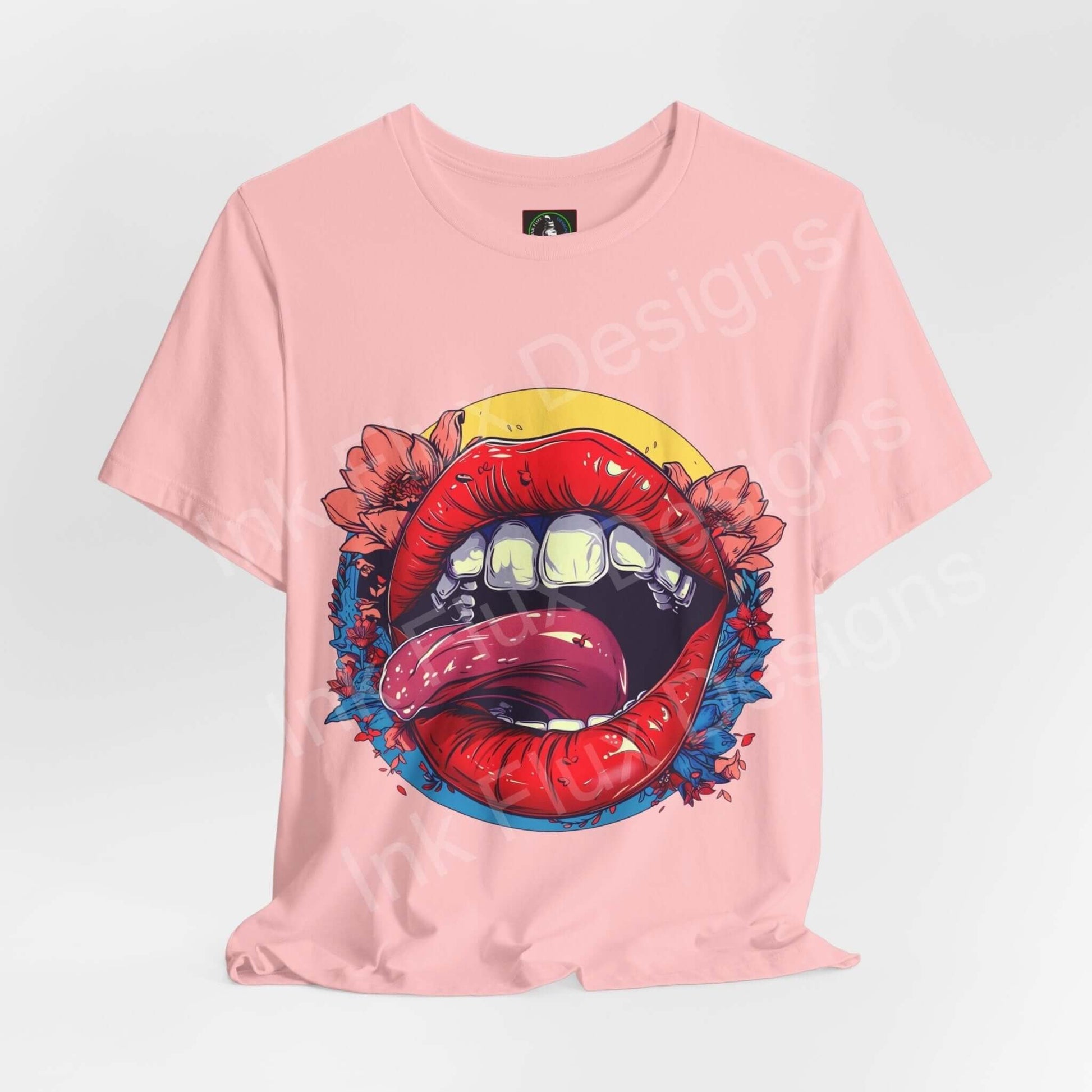 Unisex pink T-shirt with bold graphic of colorful lips and floral design, crafted from breathable cotton, perfect for style and comfort.