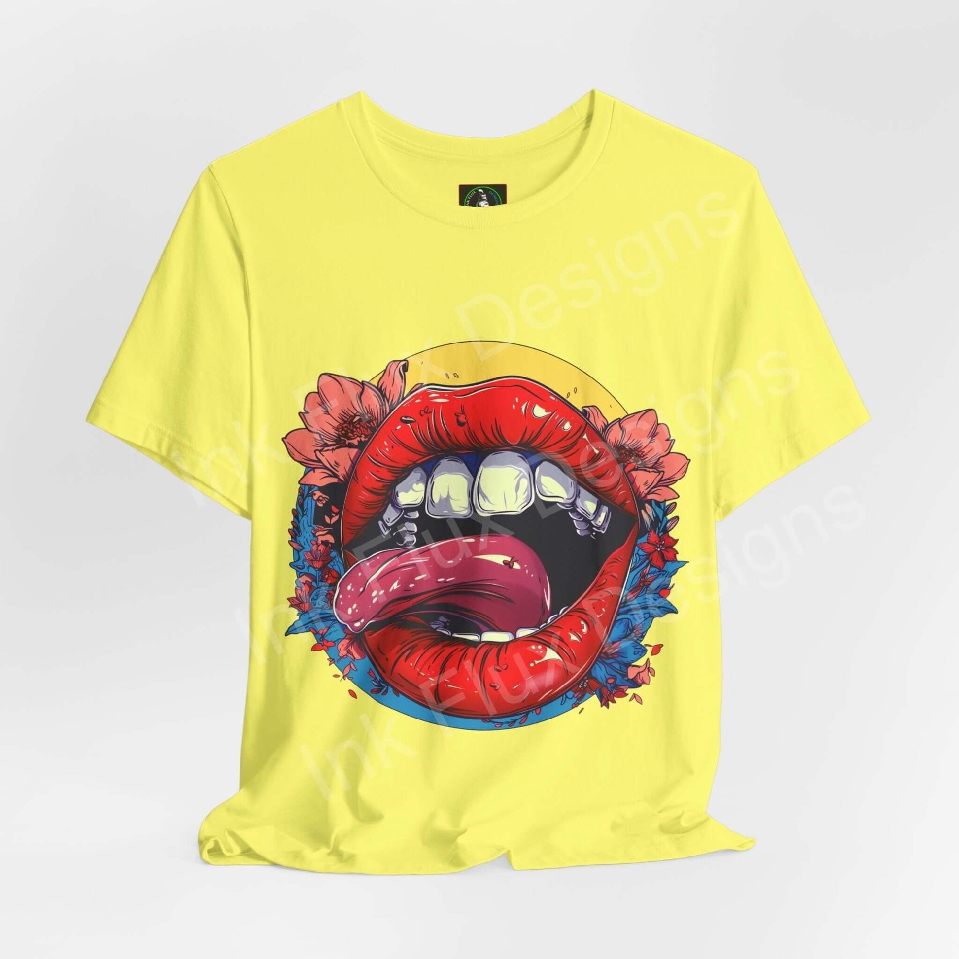 Yellow unisex jersey T-shirt featuring a bold graphic of a stylized red mouth and blue flowers, crafted from soft Airlume cotton for comfort and style.