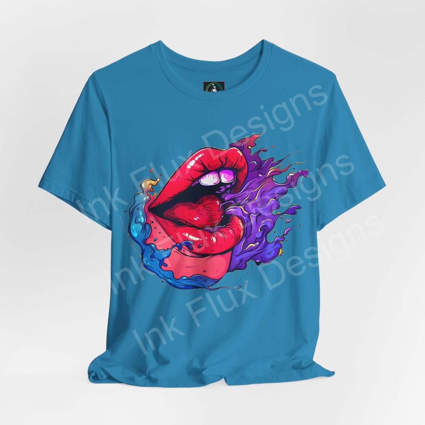 Vibrant blue unisex T-shirt featuring bold graphic print with dynamic red and purple design, crafted from sustainable Airlume cotton.