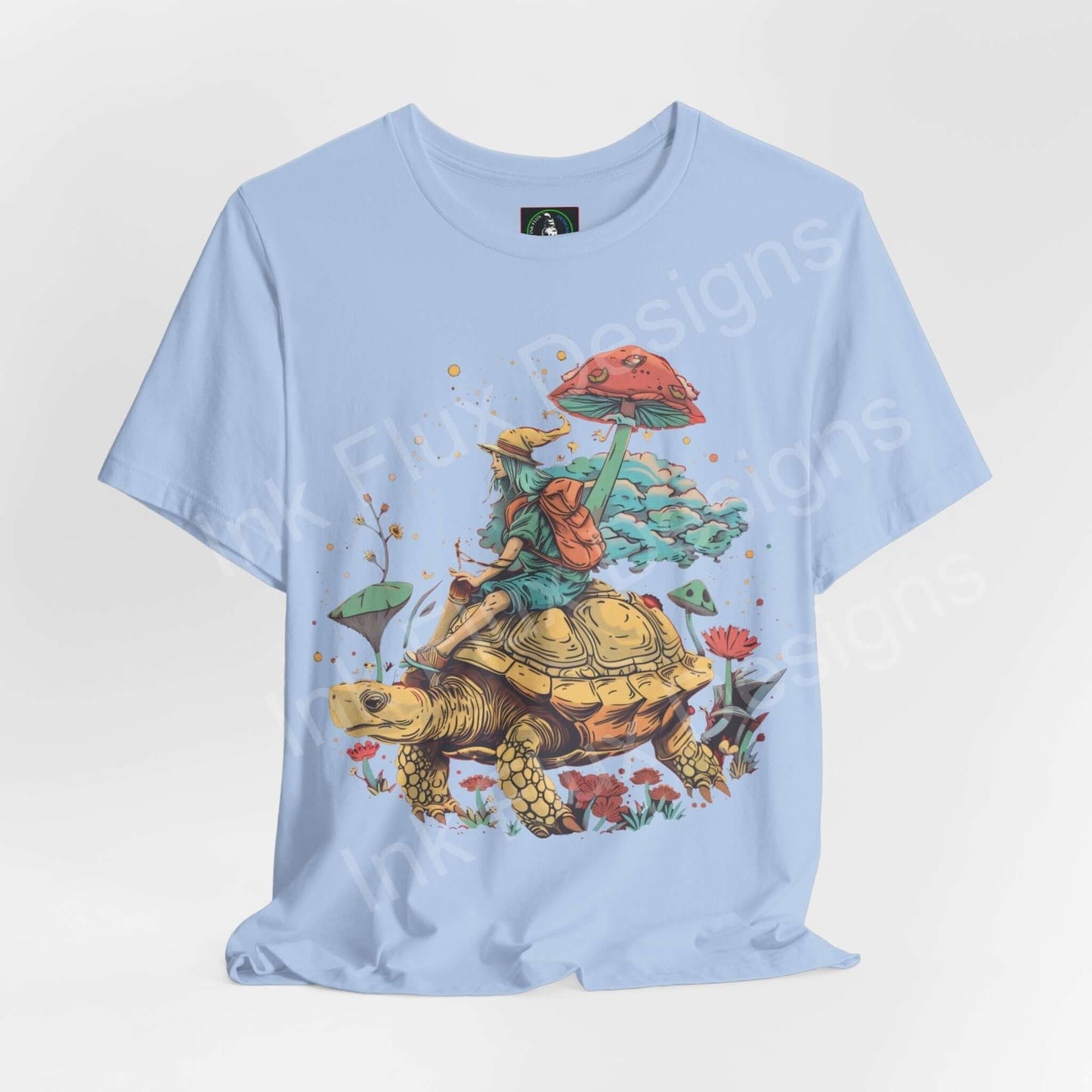 Light blue Space Turtle graphic tee featuring a psychedelic turtle and mushroom design, perfect for fans of trippy, bold tees.