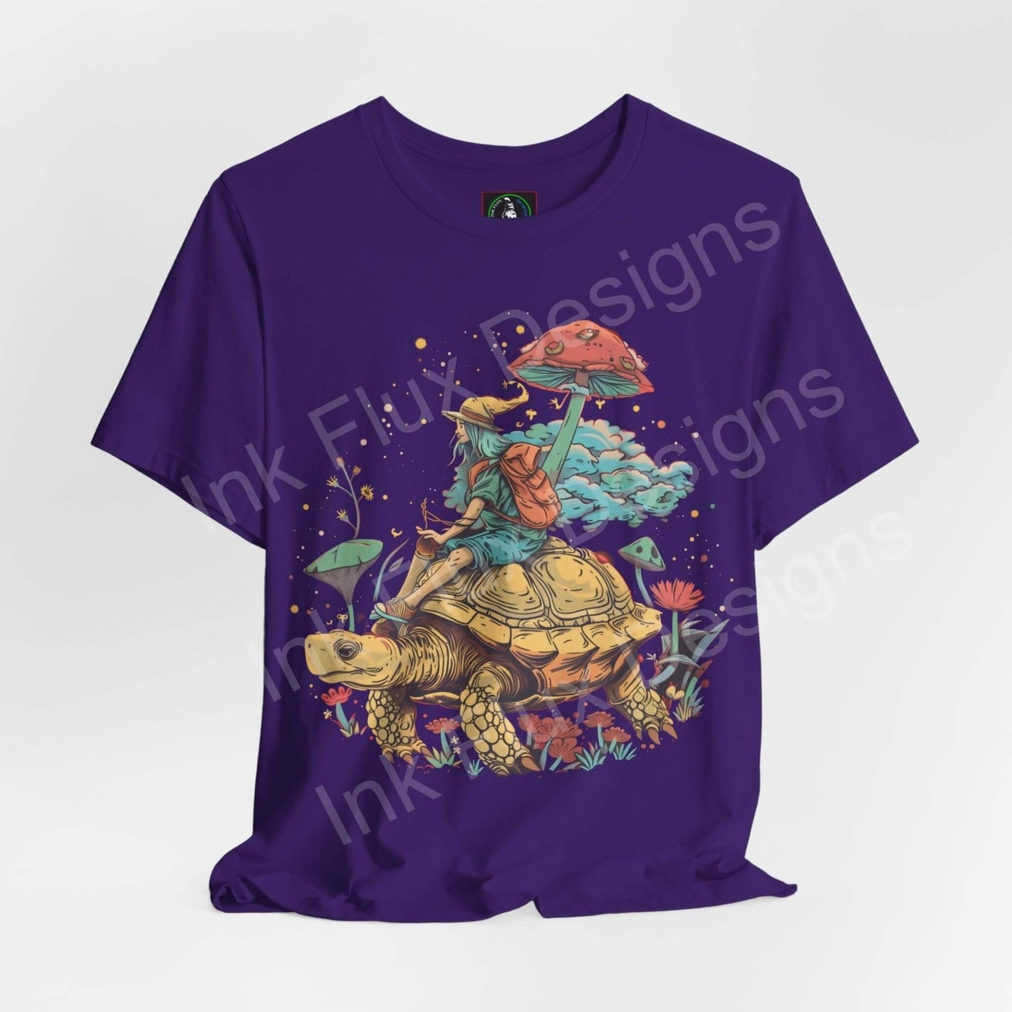 Psychedelic Space Turtle graphic tee in purple featuring a trippy turtle and mushroom design with bold, colorful graphics.
