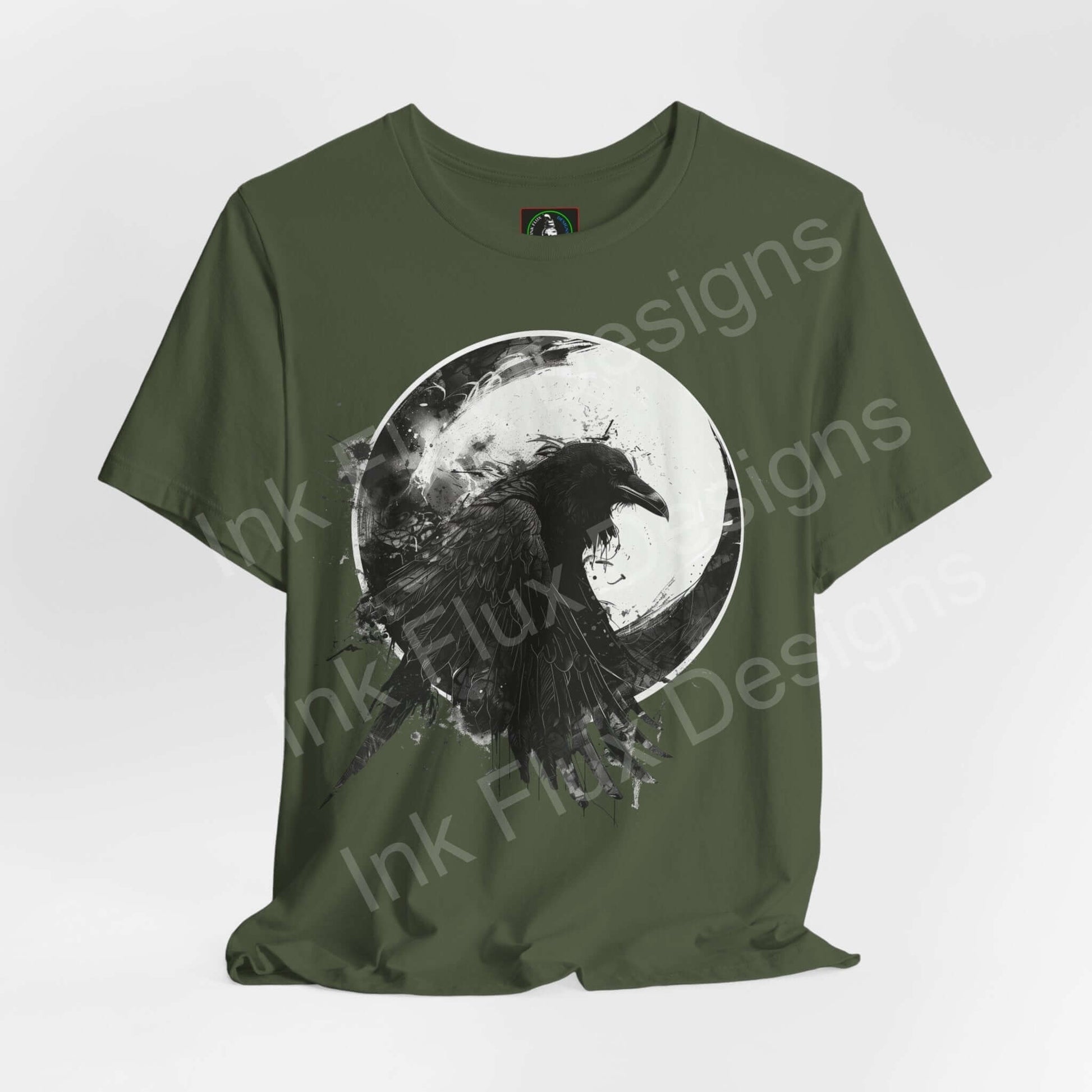Olive green 'The Raven II' unisex T-shirt featuring a large graphic of a raven against a moon, perfect for fans of spirit animals and graphic tees.