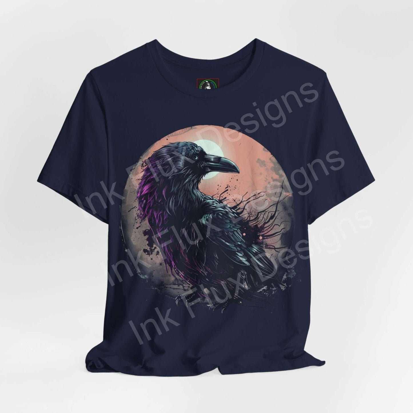 Navy unisex T-shirt featuring a vibrant graphic of a raven within a mystical circle, ideal for fans of spirit animals and graphic tees.