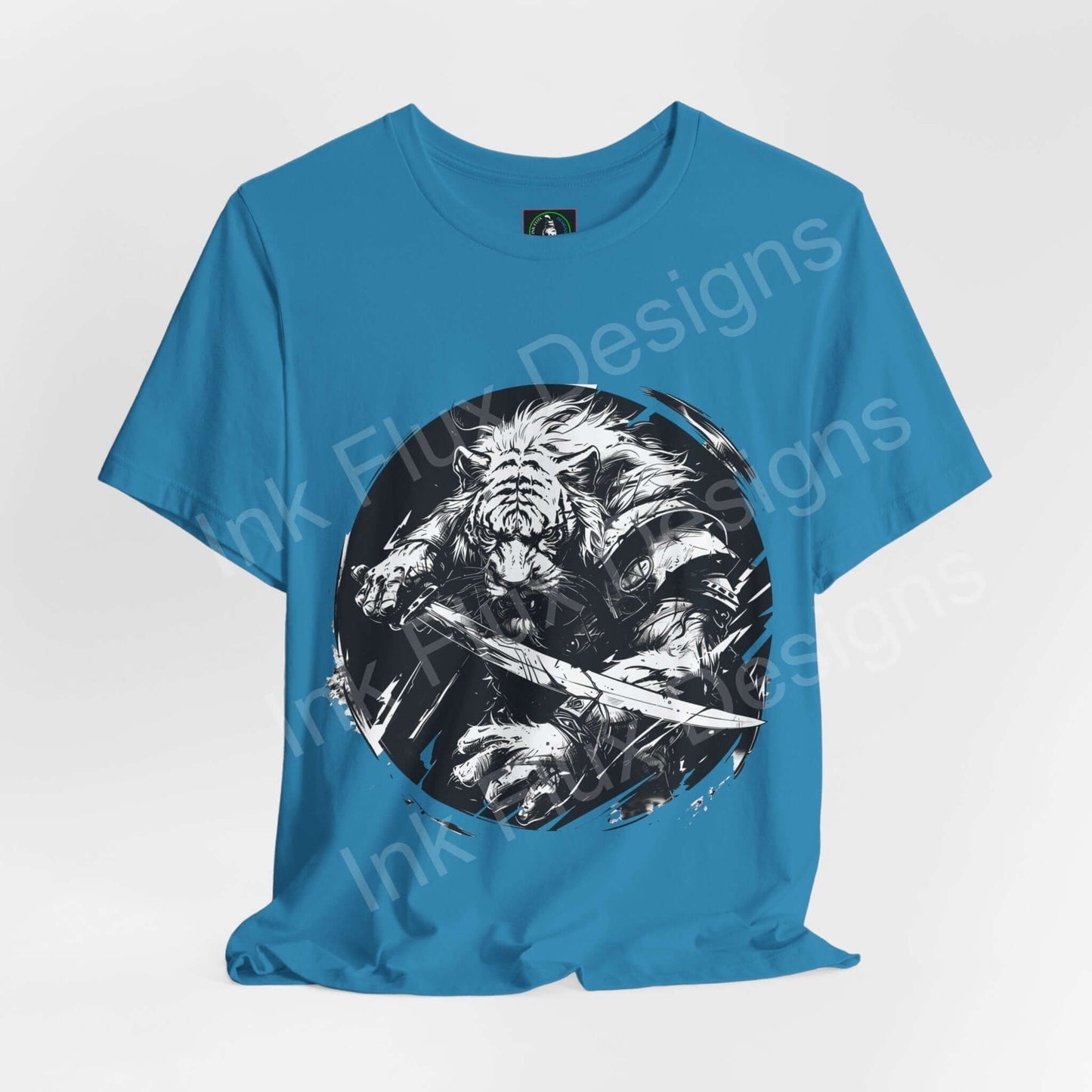 Blue unisex T-shirt featuring a bold graphic of a tiger warrior, ideal for those inspired by spirit animals, available from Bella+Canvas.