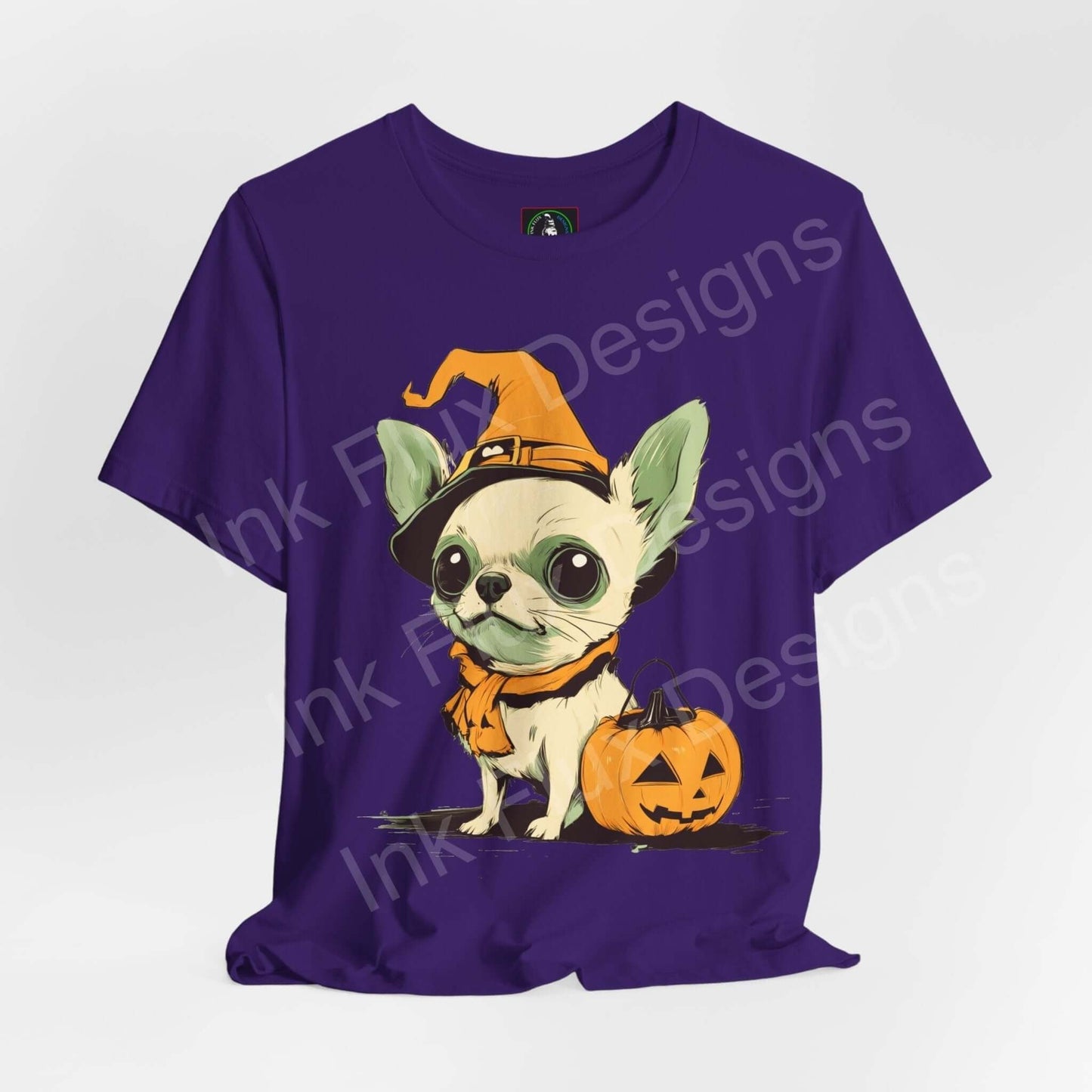 Halloween-themed purple T-shirt featuring a Chihuahua in a witch hat with a pumpkin, perfect for graphic tee enthusiasts.