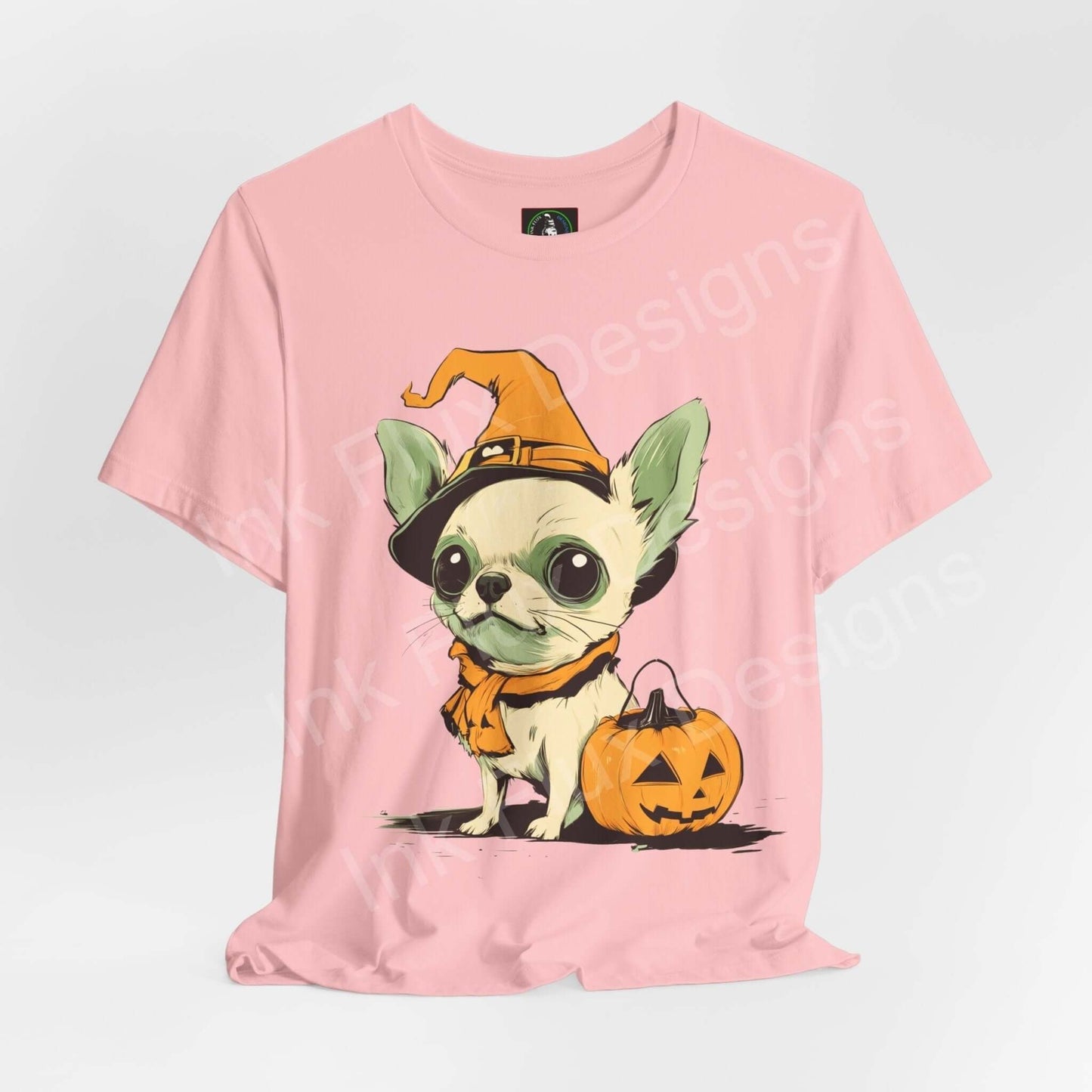 Pink Halloween-themed T-shirt featuring a cute Chihuahua in a witch hat with a pumpkin, ideal for Trick o Treat, unisex tee design.