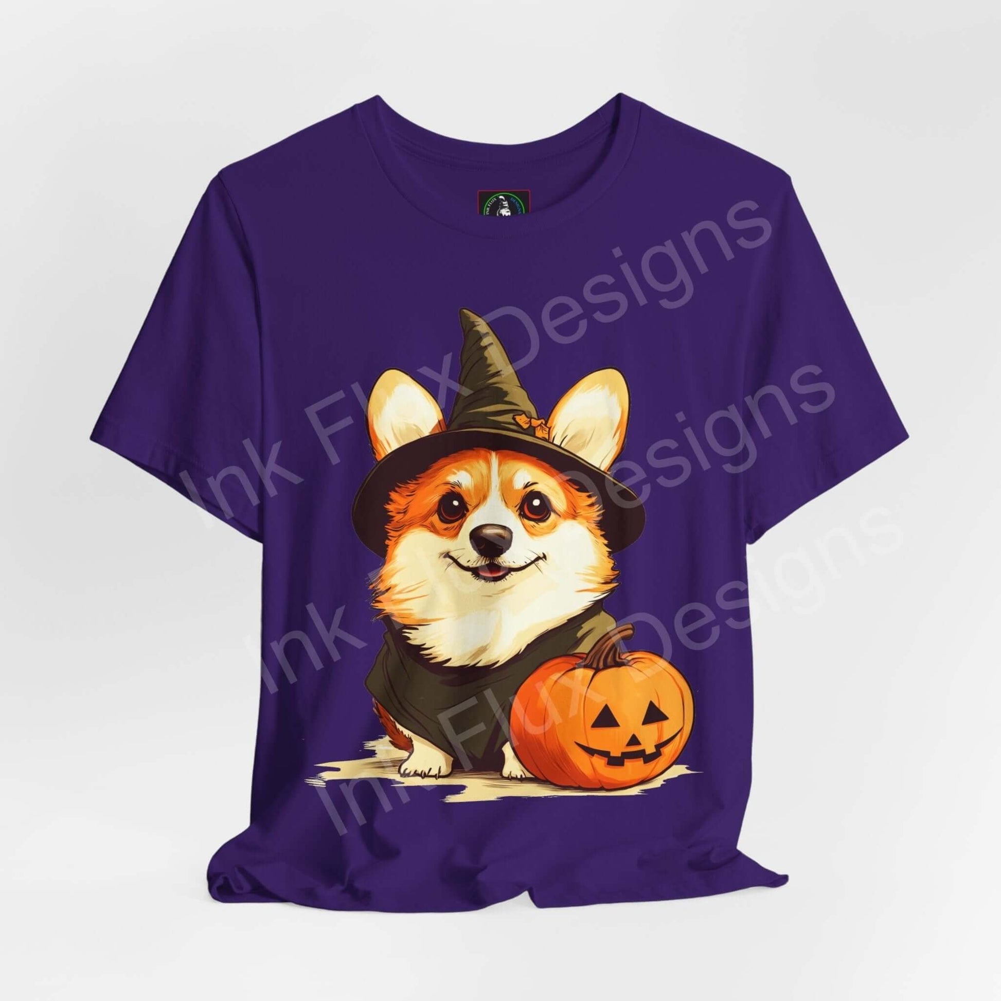 Halloween-themed T-shirt featuring a graphic of a Corgi wearing a witch hat with a pumpkin, ideal for festive graphic tees.