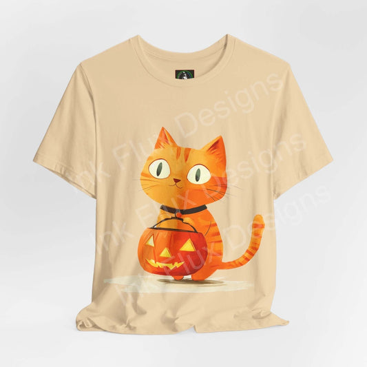 Trick o Treat Orange Cat II graphic tee featuring a cute orange cat with a pumpkin on a beige T-shirt, perfect for Halloween.