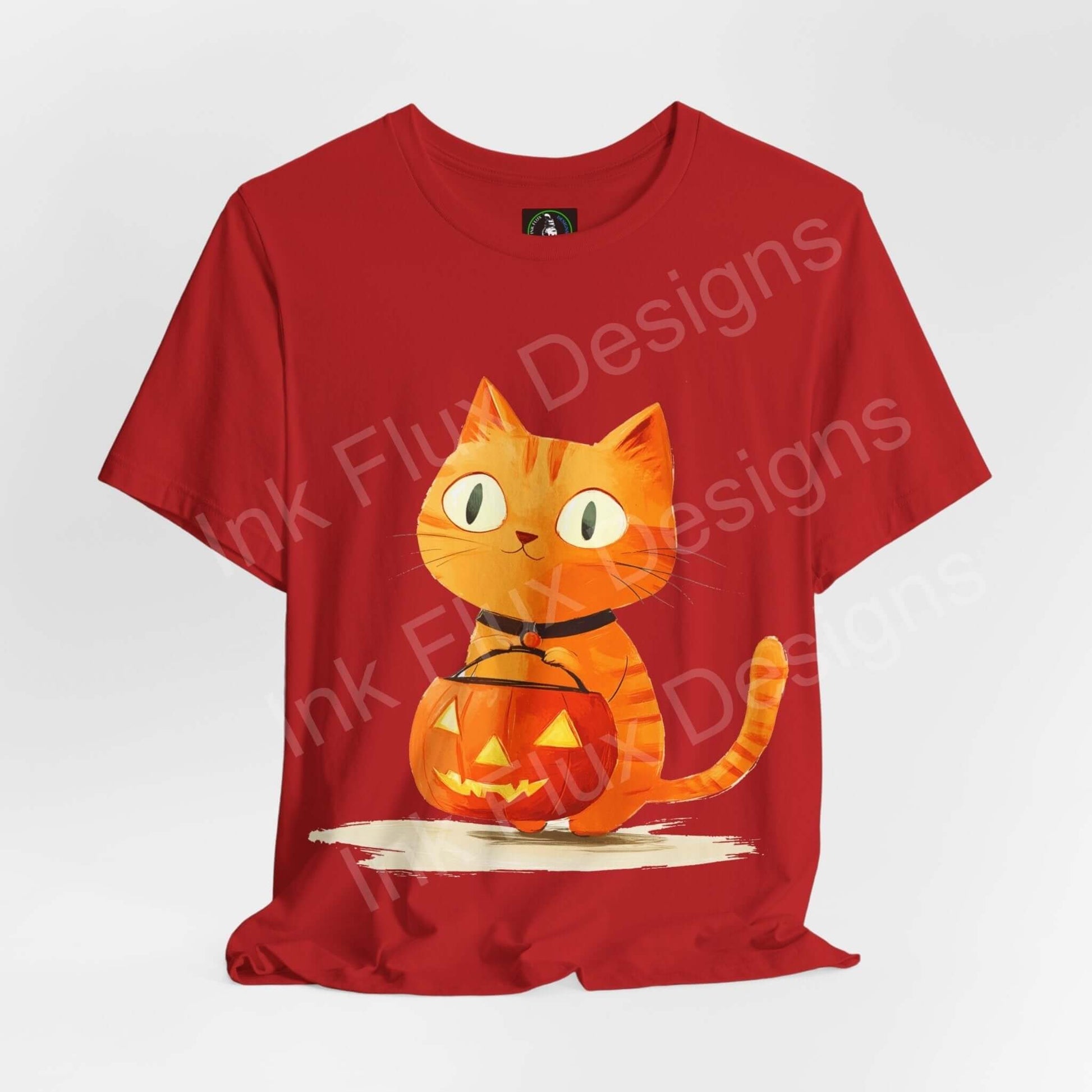 Red Halloween T-shirt featuring an orange cat graphic with a pumpkin, designed for style and comfort.