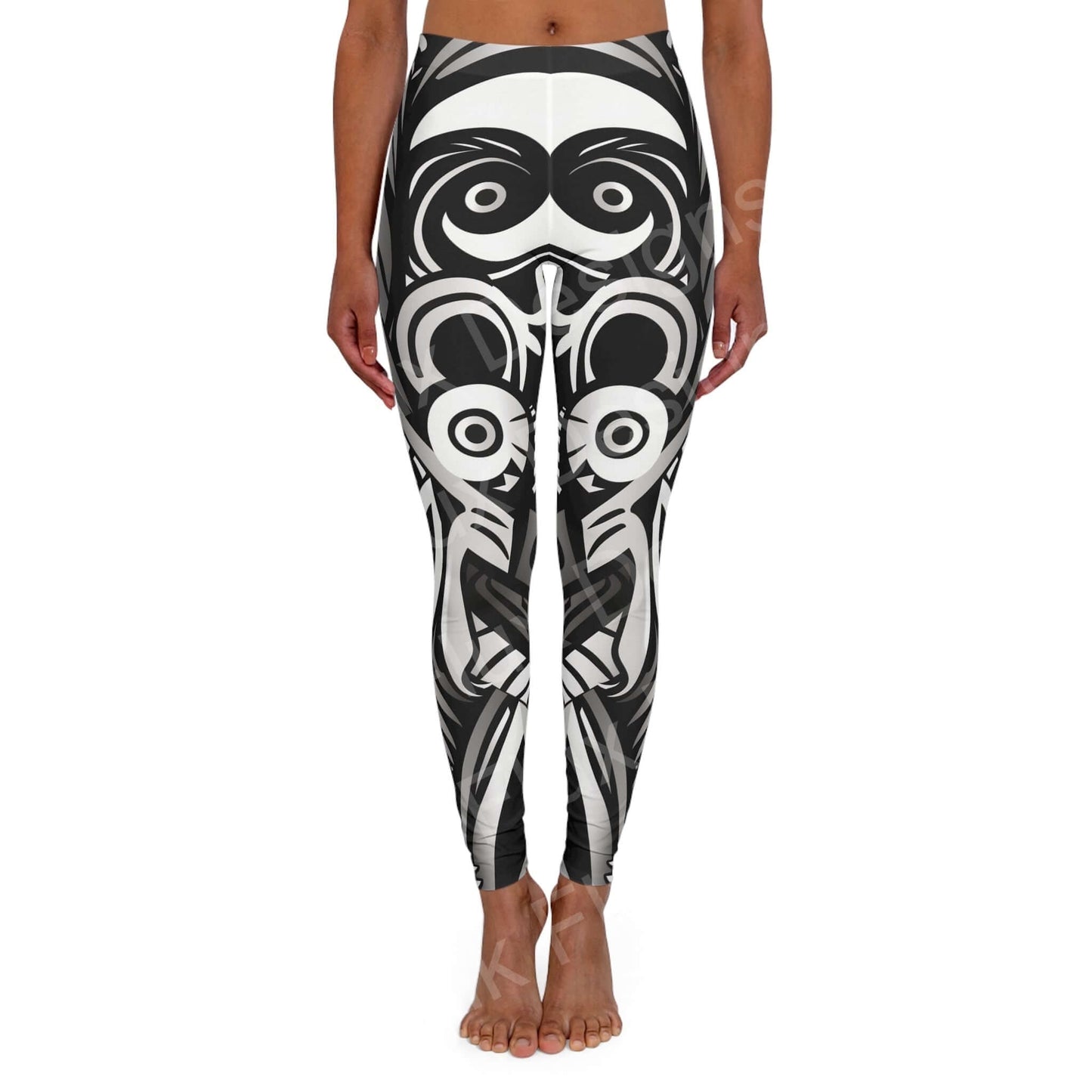 Woman standing wearing Trippy Leggings VIII with bold black and white abstract design, front view, highlighting a skinny fit and double layer waistband.