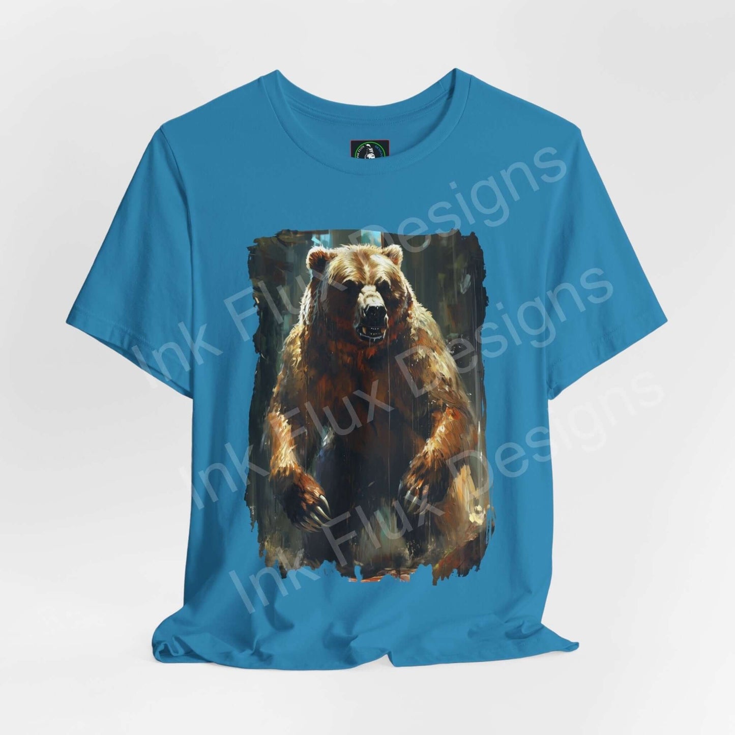 Unisex blue T-shirt featuring a bold graphic of a roaring Kodiak bear, ideal for lovers of spirit animals and graphic tees.