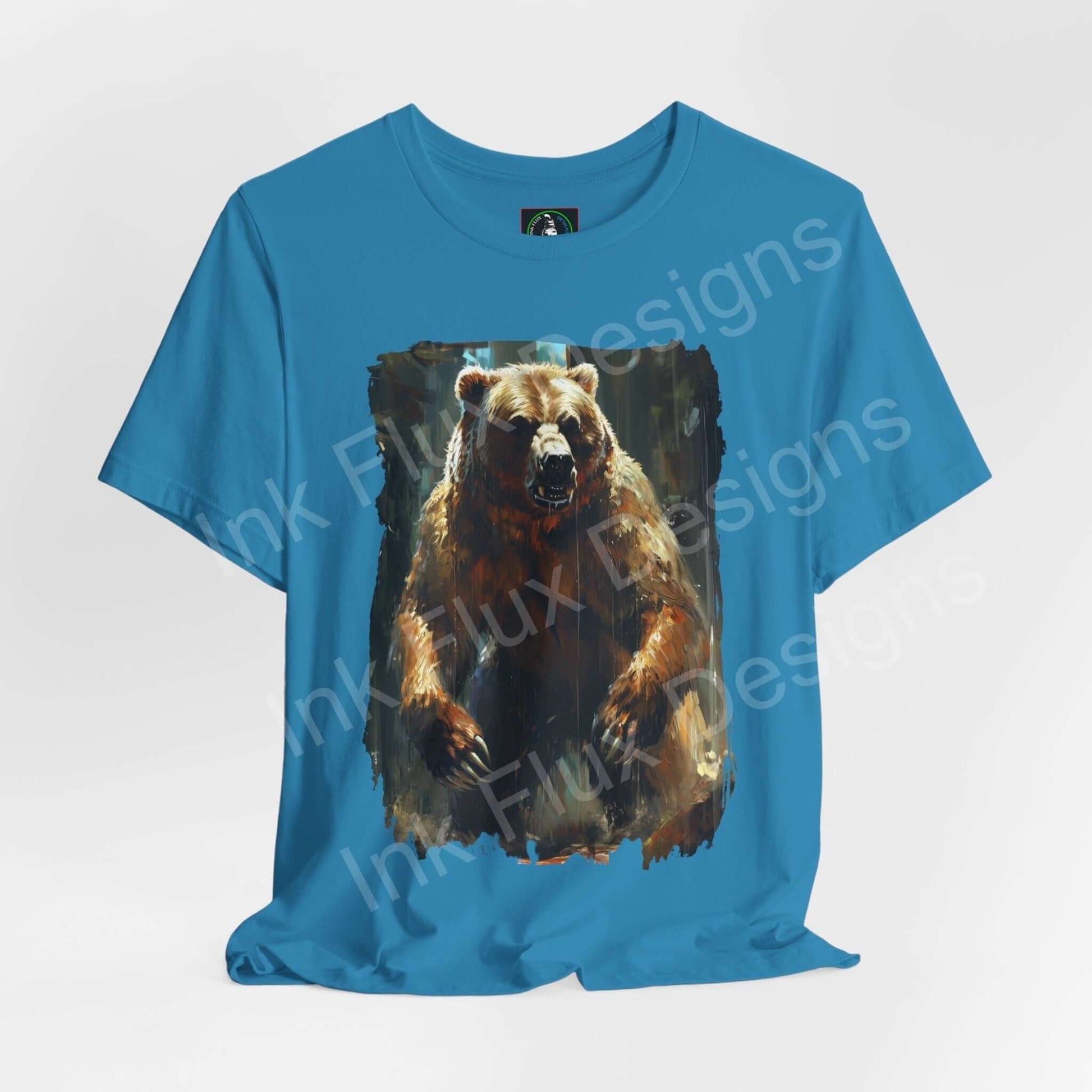 Unisex blue T-shirt featuring a bold graphic of a roaring Kodiak bear, ideal for lovers of spirit animals and graphic tees.