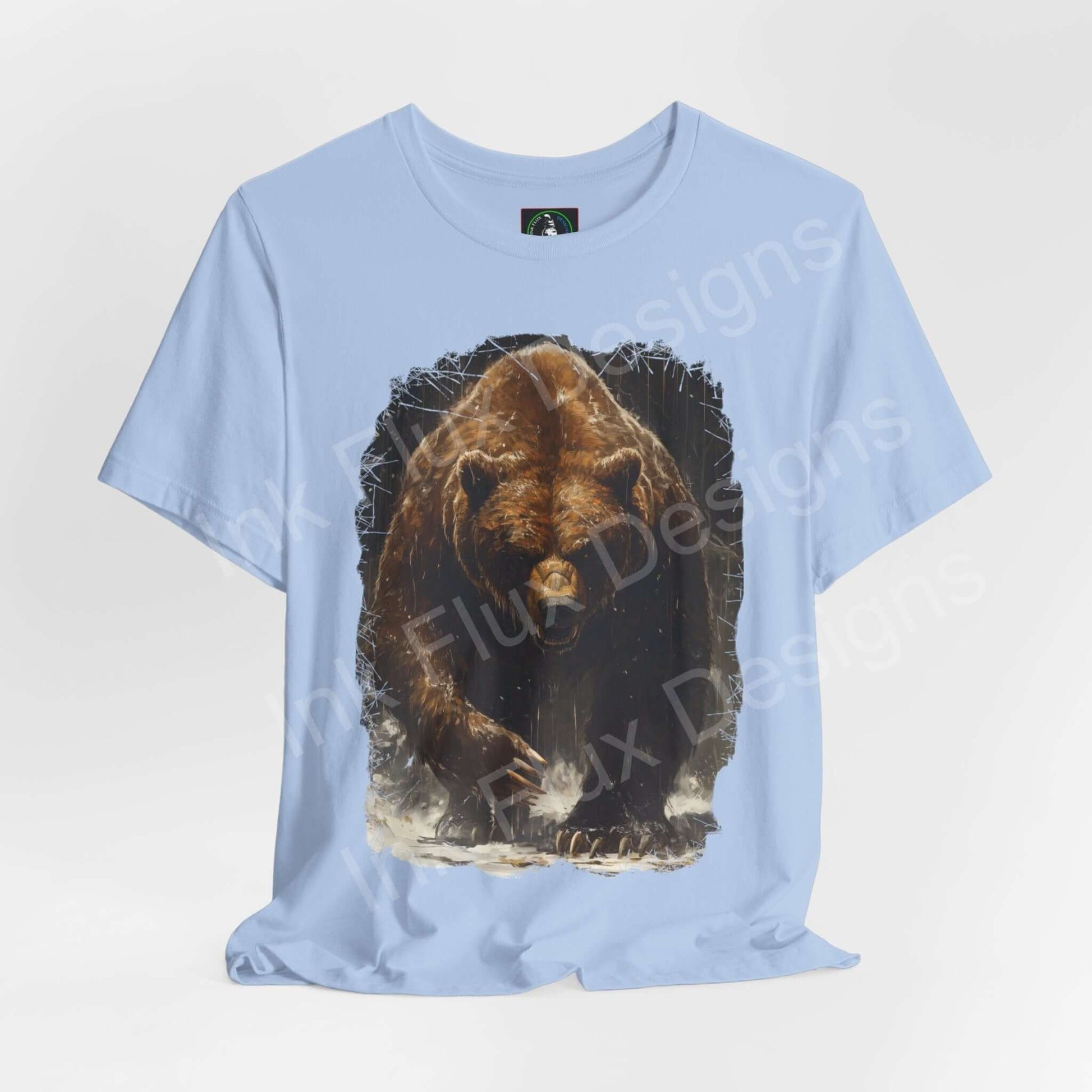 Light blue unisex T-shirt featuring a graphic of a roaring Kodiak bear, from Bella+Canvas, emphasizing comfort and style with a focus on sustainability.