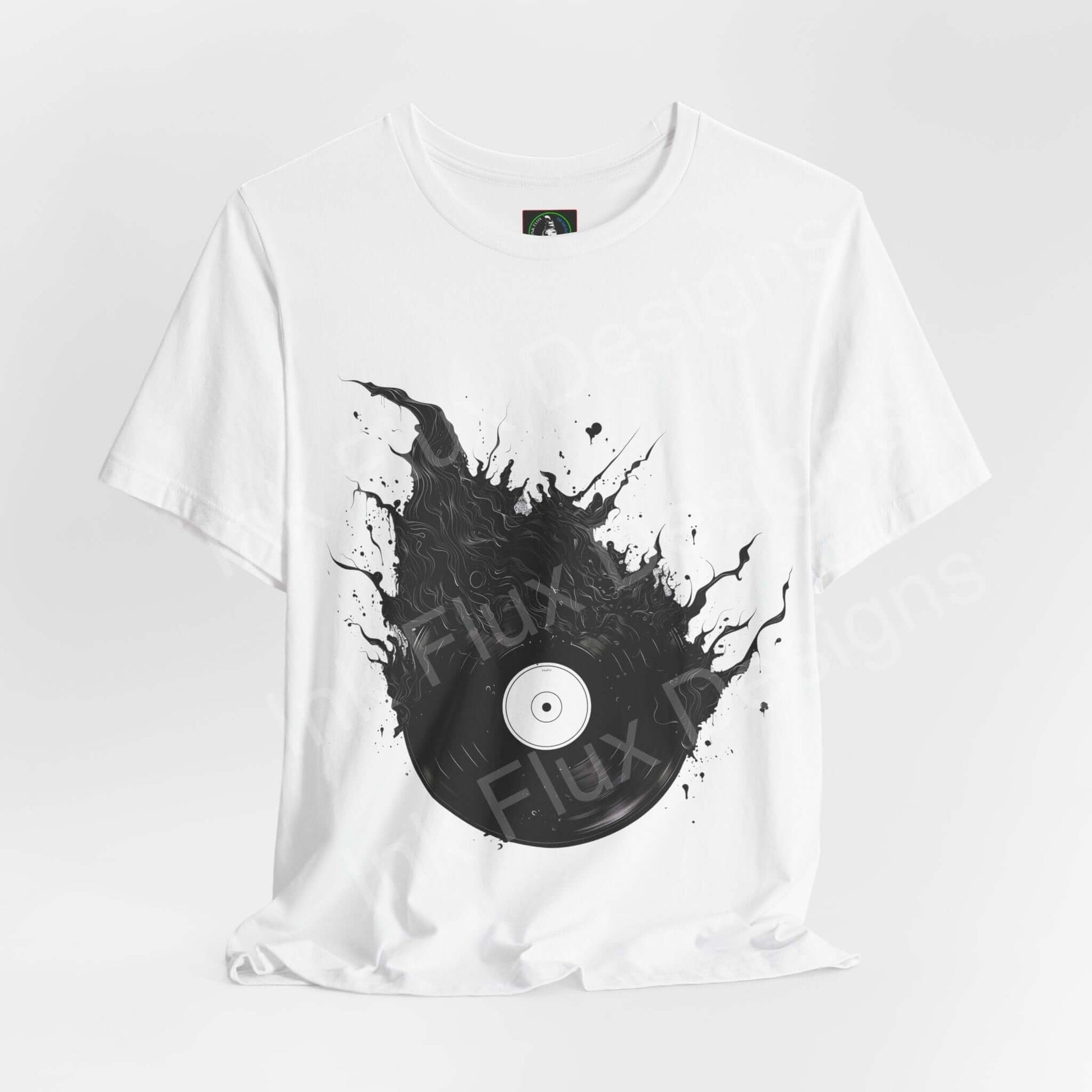 Unisex white jersey T-shirt featuring a bold graphic of a black vinyl record splattered with ink, by Bella+Canvas, perfect for music lovers.