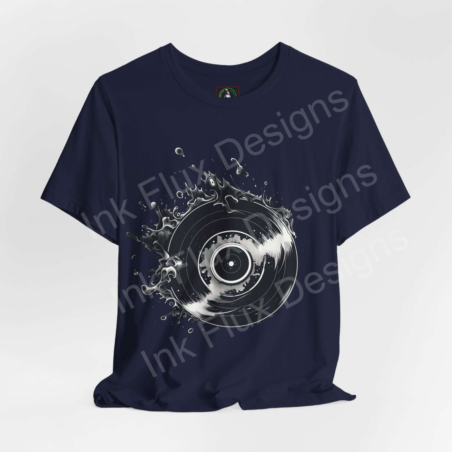 Navy blue unisex T-shirt with bold graphic vinyl record design, made from breathable Airlume cotton, ideal for stylish comfort.