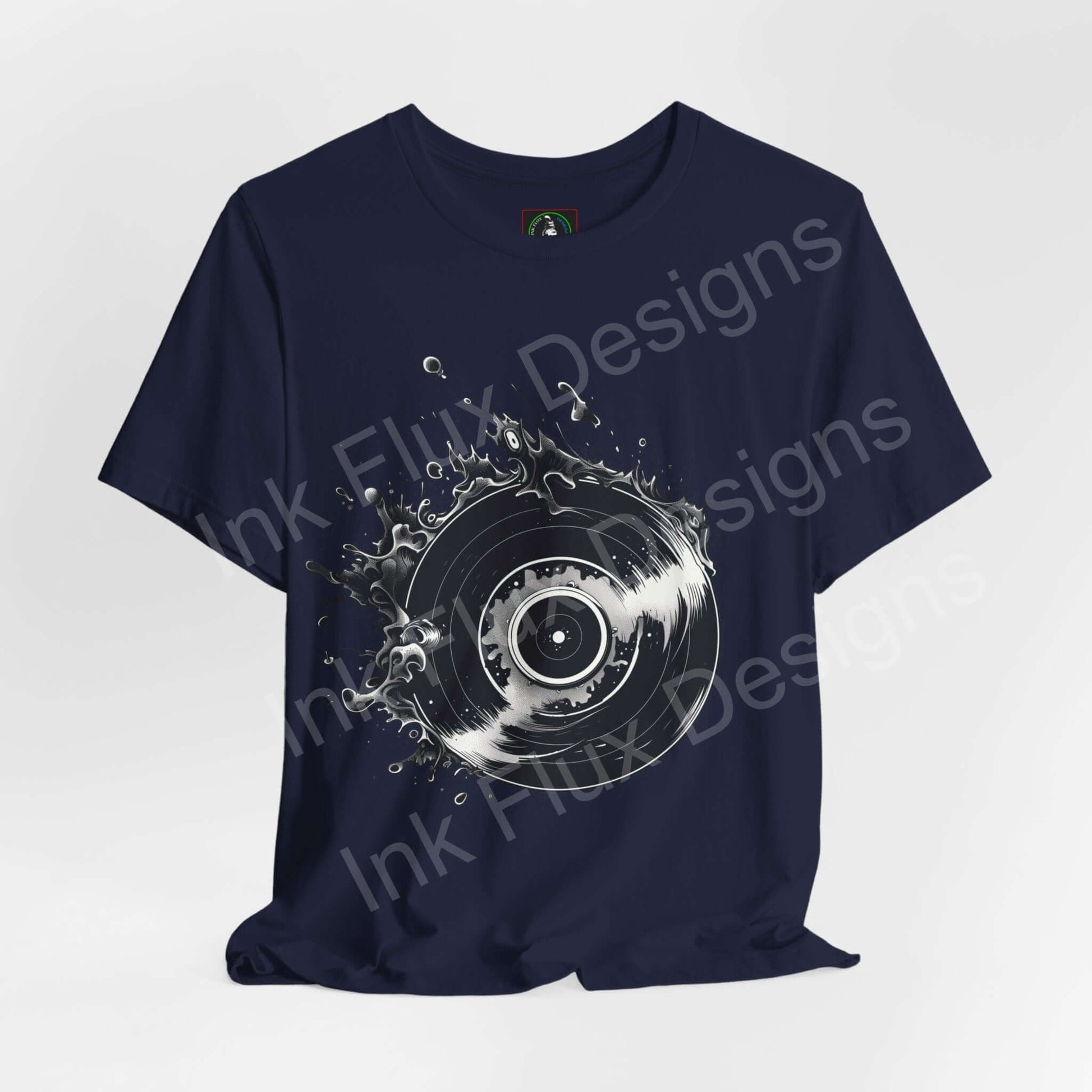 Navy blue unisex T-shirt with bold graphic vinyl record design, made from breathable Airlume cotton, ideal for stylish comfort.