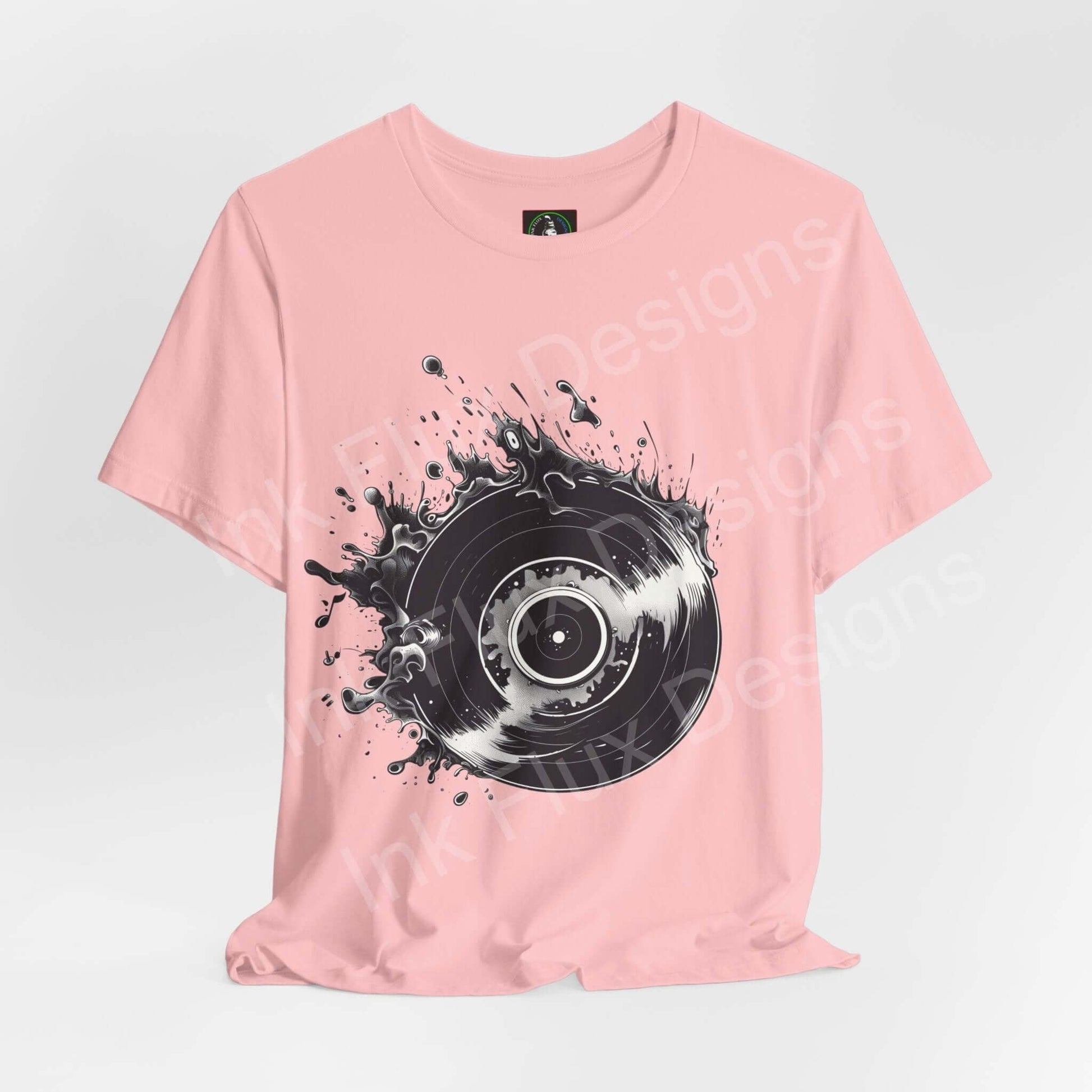 Pink unisex jersey T-shirt featuring a bold graphic of a vinyl record with splashing ink, from Bella+Canvas
