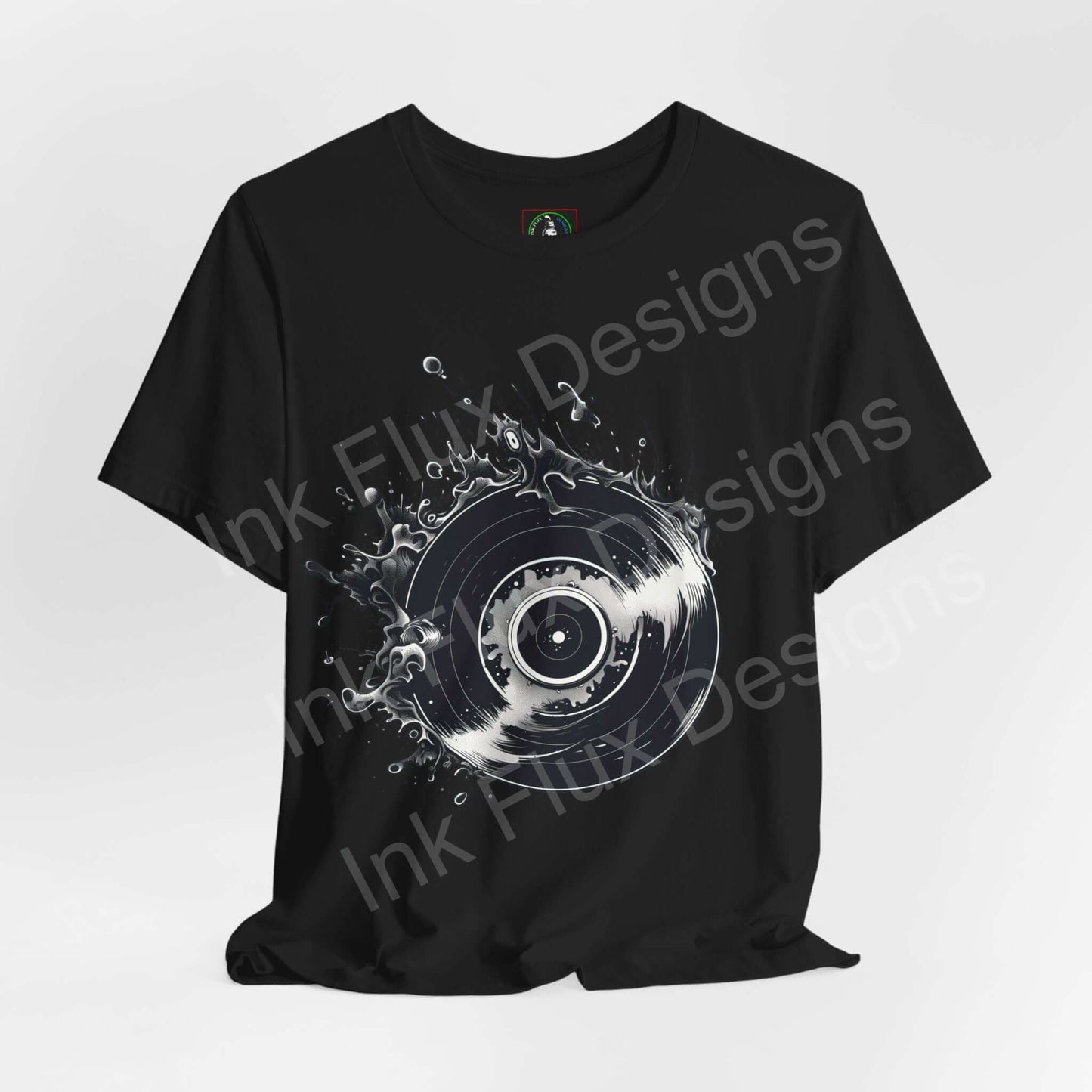 Black unisex T-shirt with a bold graphic of a vinyl record in a dynamic splash design, showcasing a modern and artistic style.