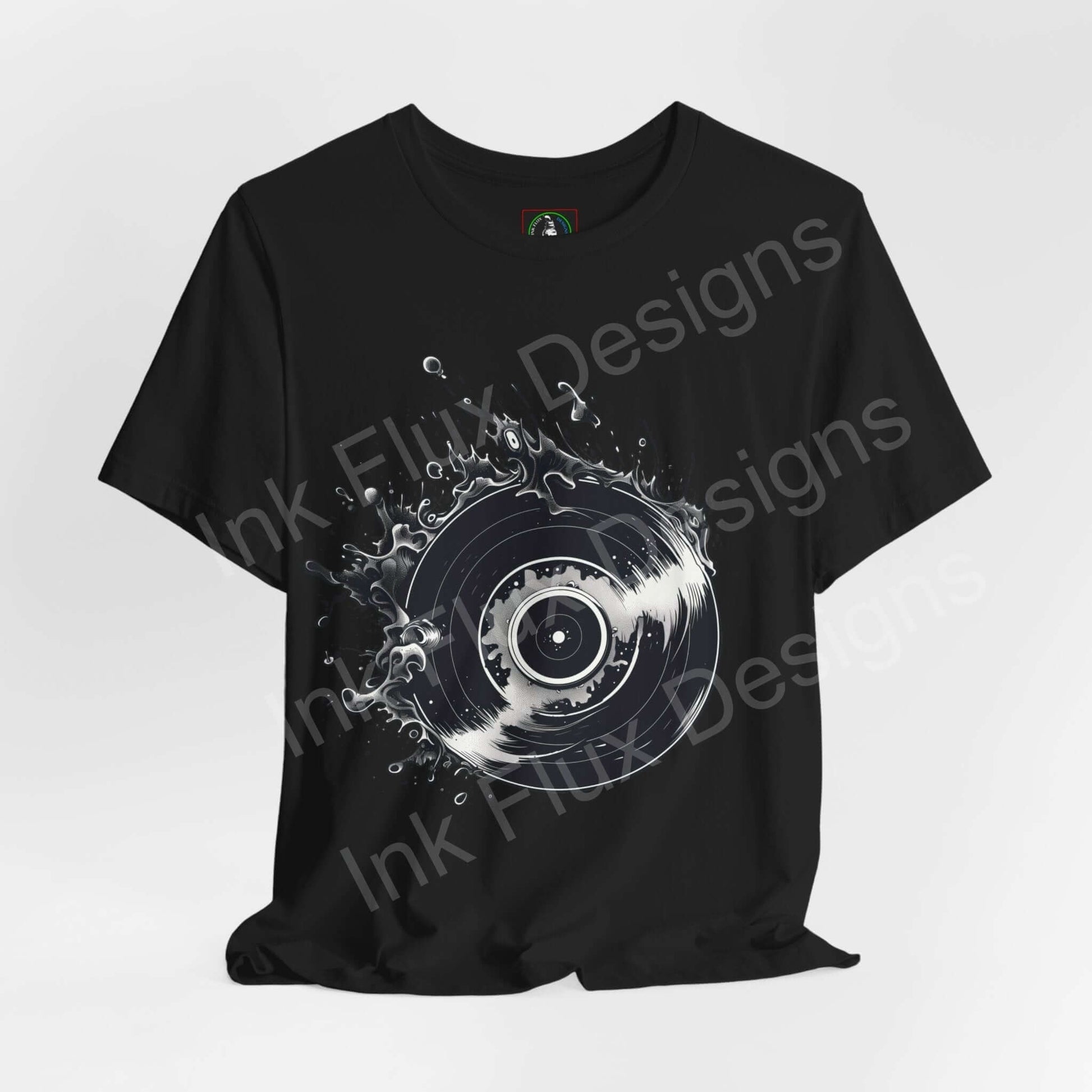 Black unisex T-shirt with a bold graphic of a vinyl record in a dynamic splash design, showcasing a modern and artistic style.