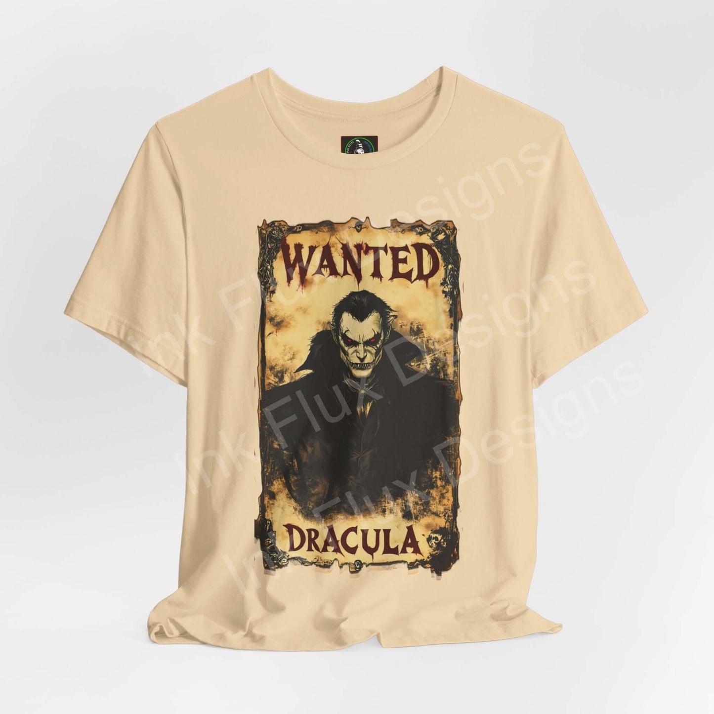 Unisex beige Halloween graphic tee featuring a "Wanted Dracula" design, crafted from soft Airlume cotton by Bella+Canvas.