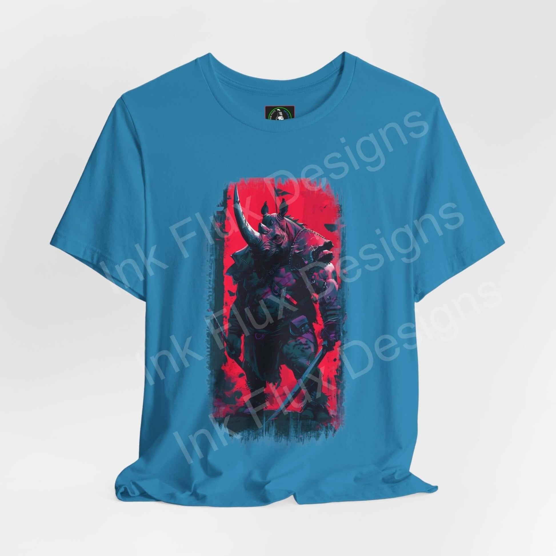 Blue unisex T-shirt with vibrant War Rhino graphic design, showcasing striking red and pink hues, perfect for fans of spirit animals and graphic tees.