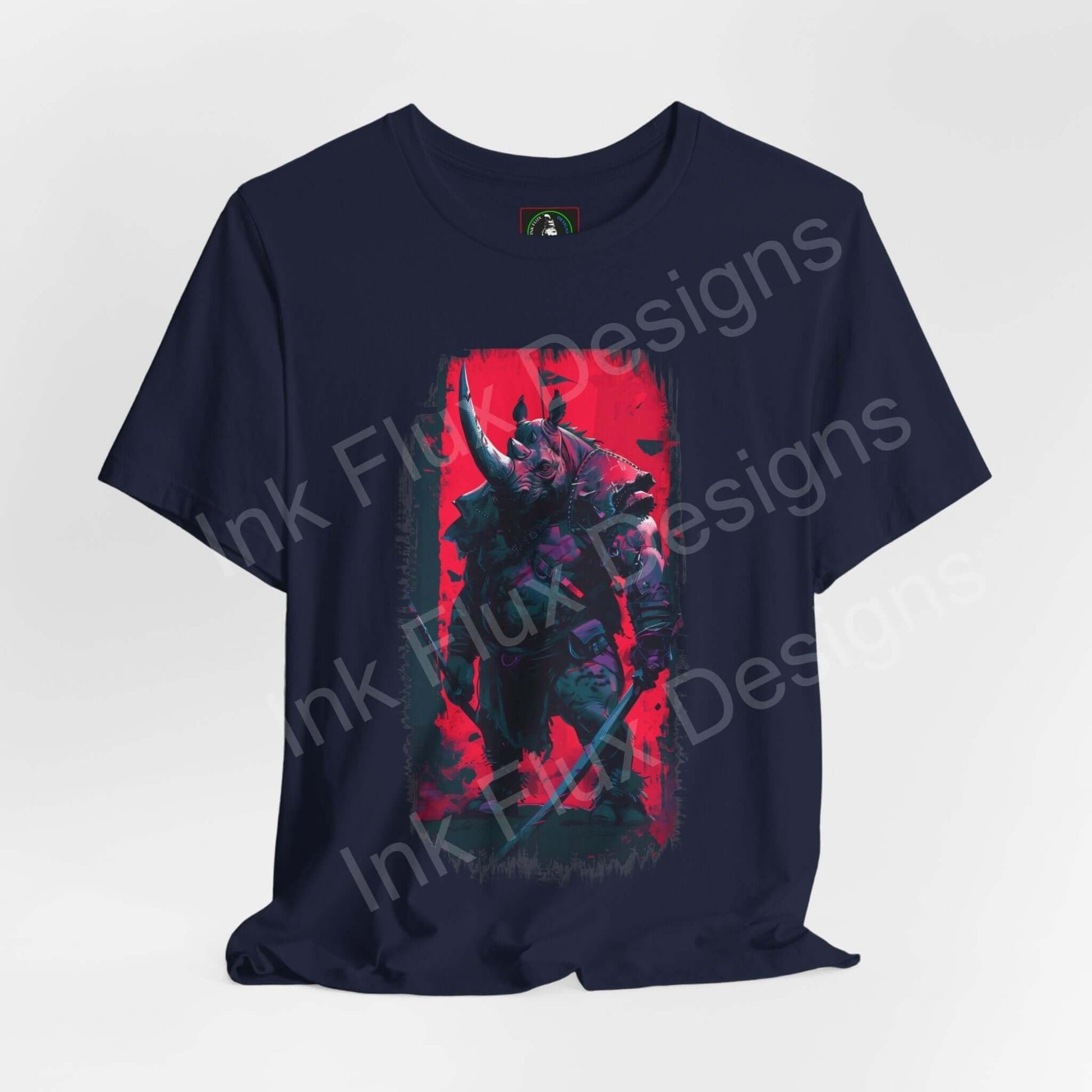 Navy unisex T-shirt with a vibrant red and blue graphic of a war rhino, exemplifying a spirit animal design, crafted by Bella+Canvas for style and sustainability.