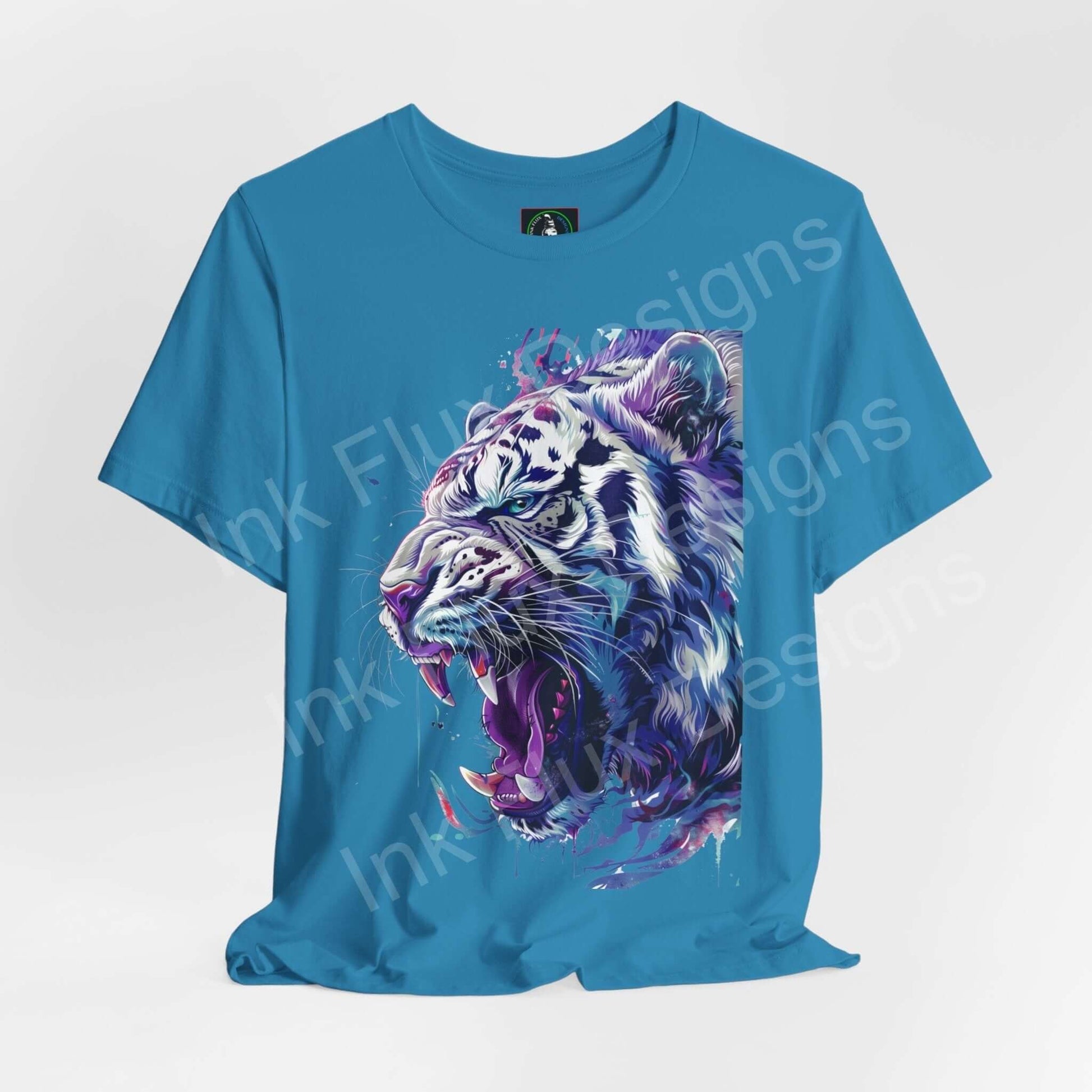 Vibrant blue unisex jersey T-shirt featuring a colorful graphic of a white tiger, ideal for lovers of spirit animals and graphic tees.