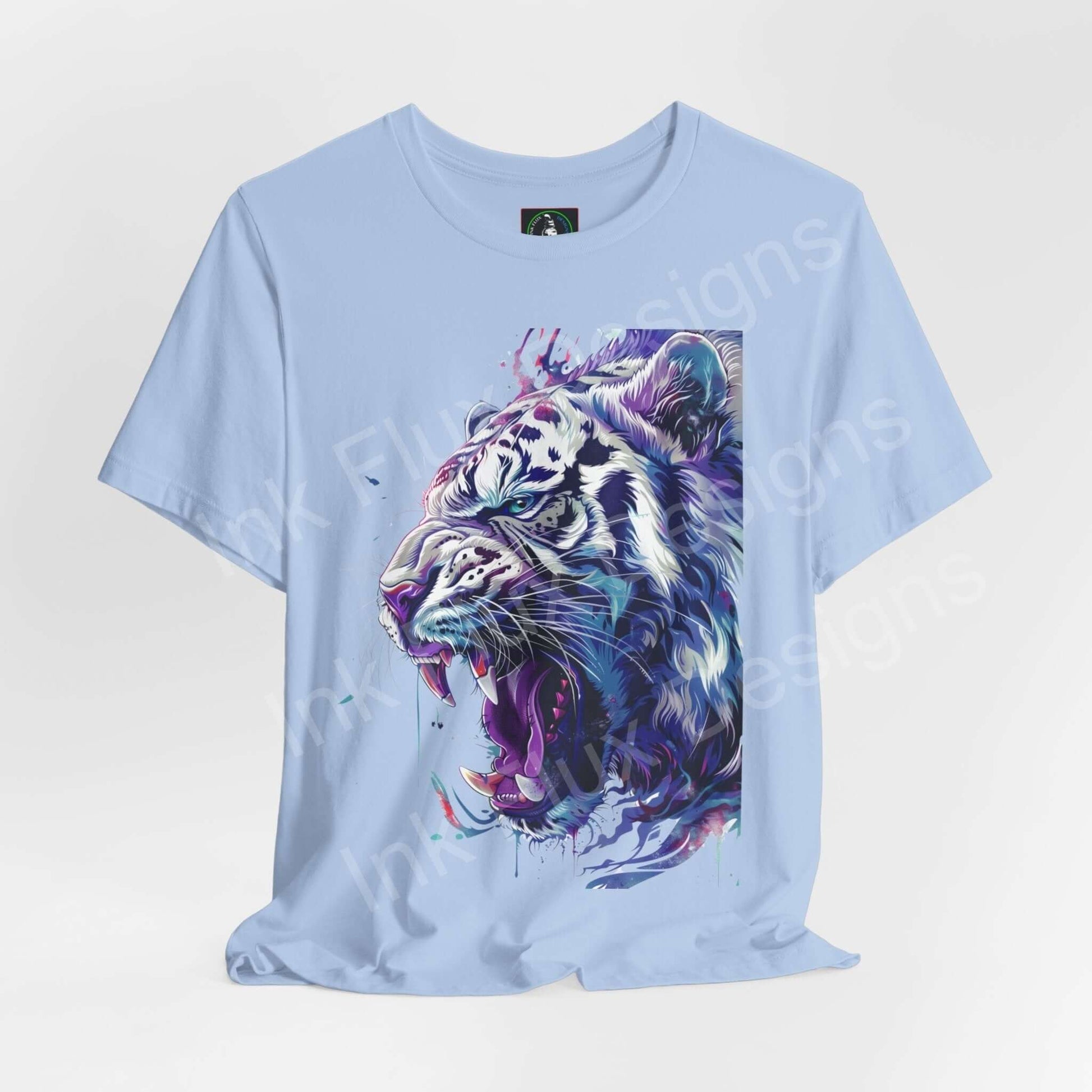 Stylish unisex light blue T-shirt featuring a vibrant graphic of a white tiger, ideal for lovers of spirit animals and graphic tees.