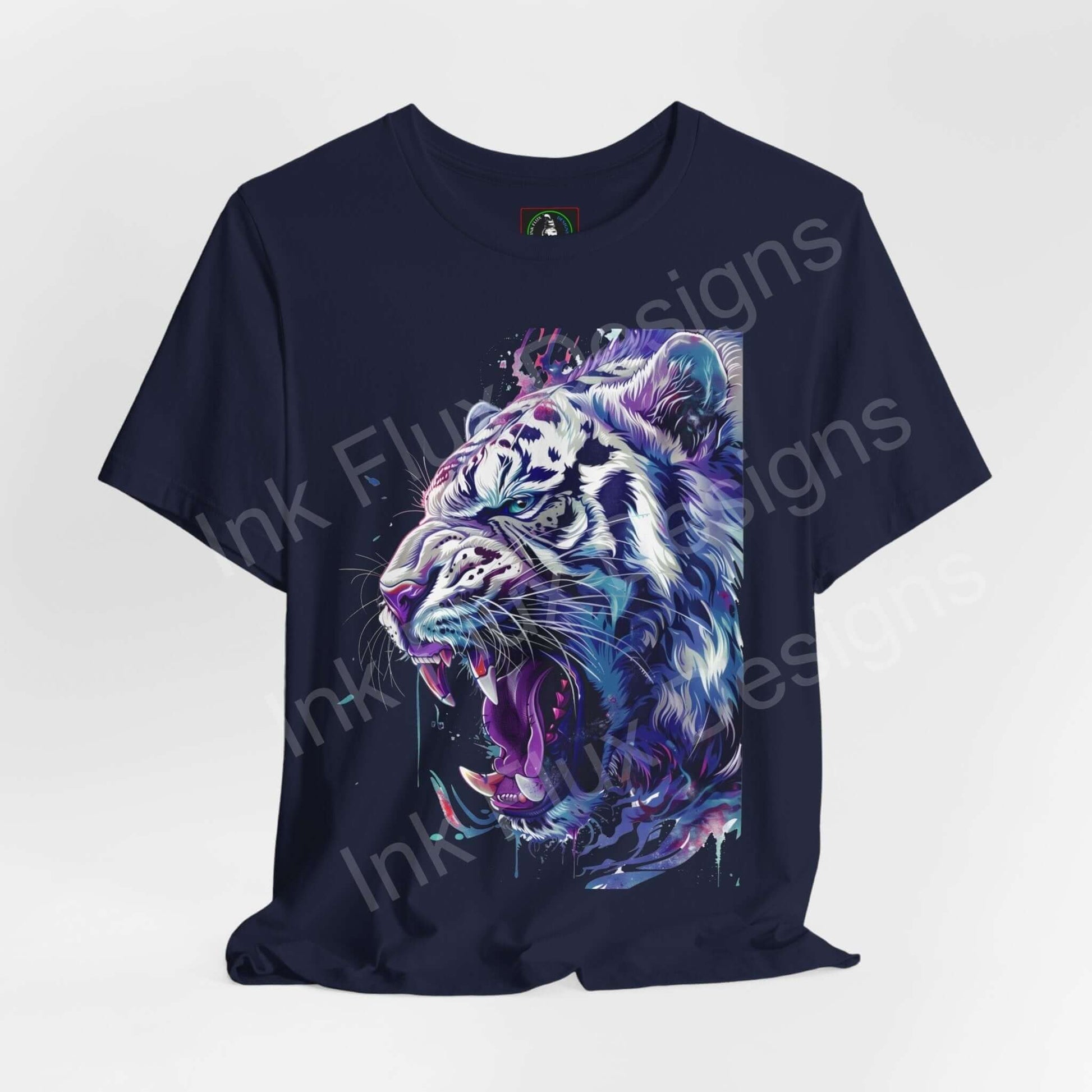 Navy blue graphic tee featuring a vibrant white tiger design, part of the unisex Bella+Canvas ethically made T-shirt collection.