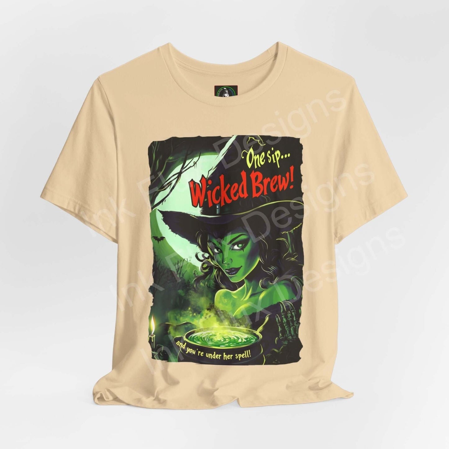 Halloween-themed "Wicked Brew!" graphic tee in beige with green witch illustration, perfect for casual occasions, made by Bella+Canvas