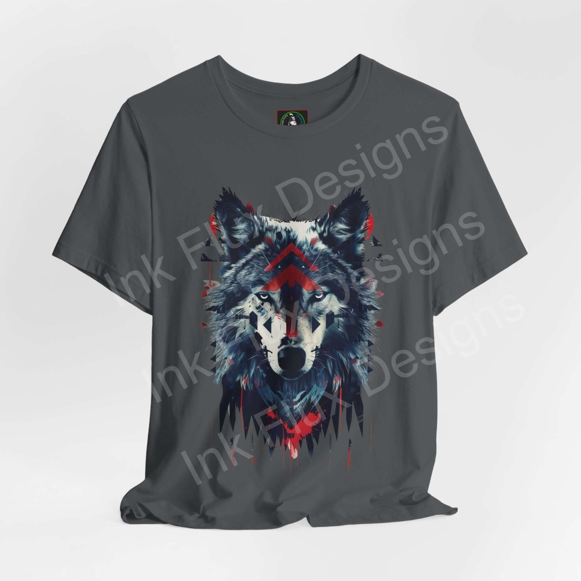 Unisex grey T-shirt featuring a detailed graphic of a wolf with tribal elements, ideal for fans of spirit animals and graphic tees.