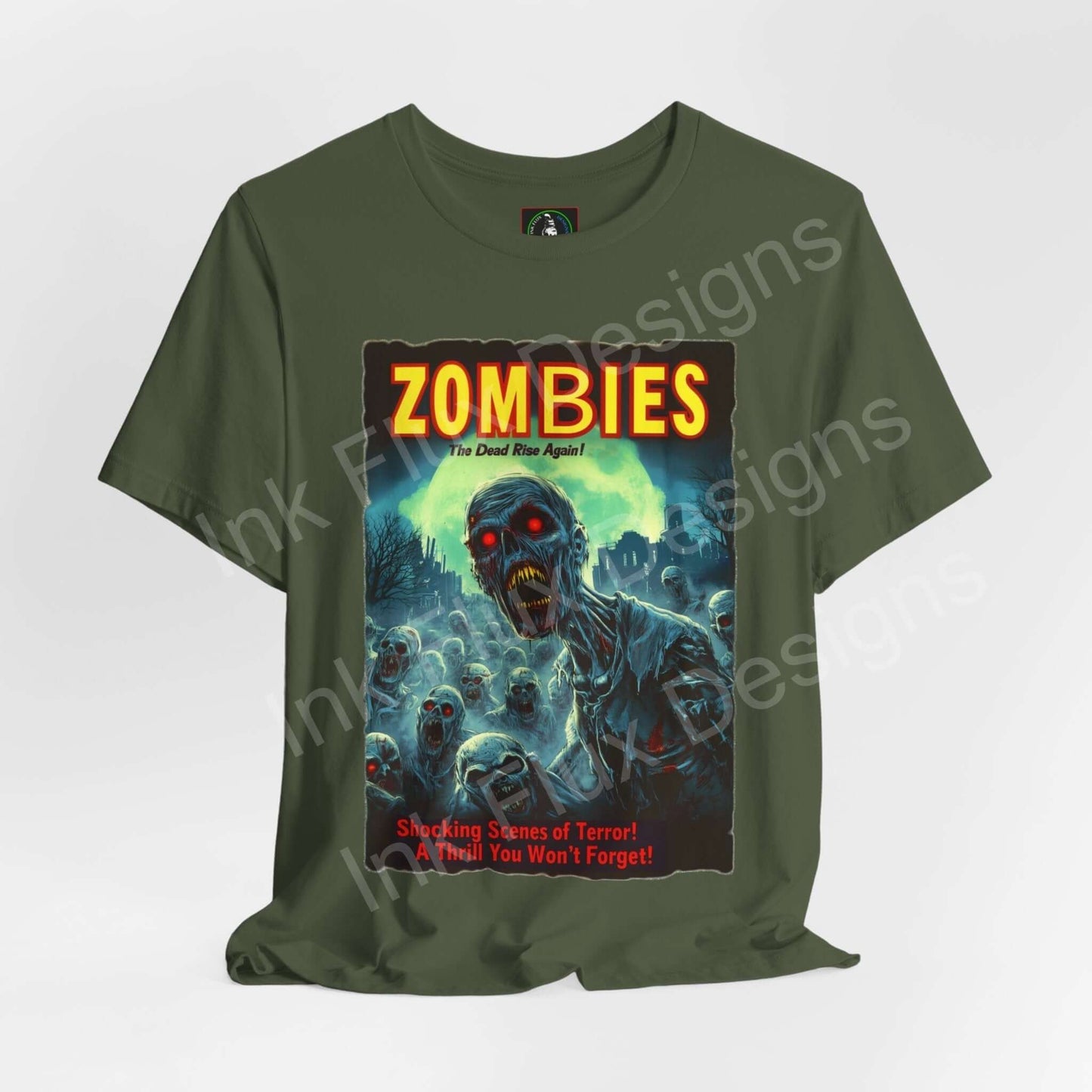 Green "Zombies! The Dead Rise Again" graphic tee featuring zombie artwork, ideal for Halloween.