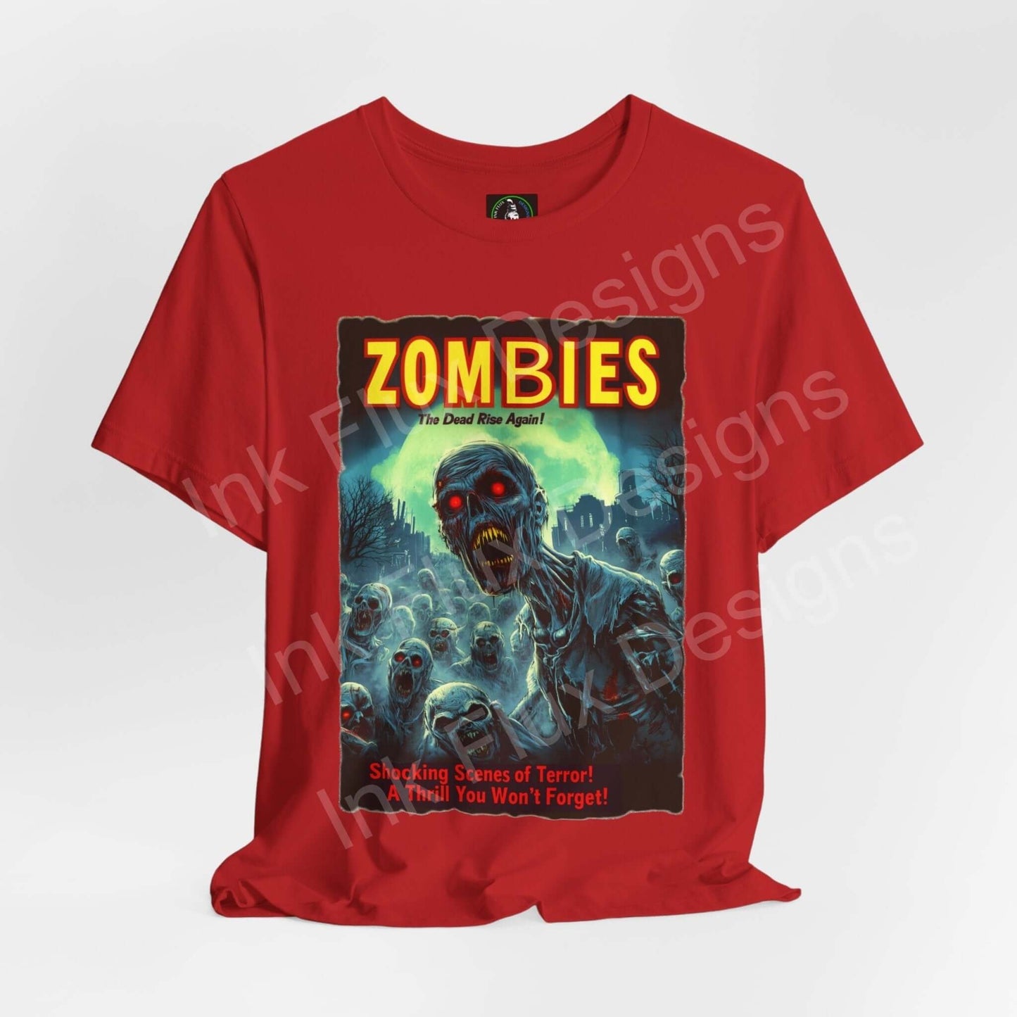 Red Halloween graphic tee featuring a 'Zombies! The Dead Rise Again' design with ghoulish figures, ideal for Halloween and casual wear.