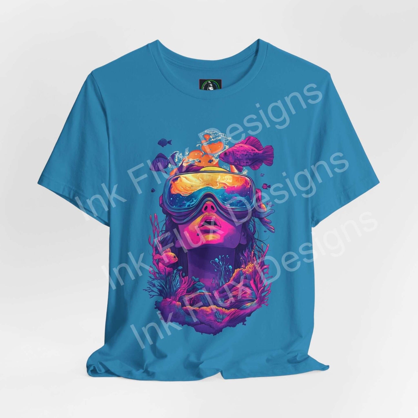 Vibrant blue T-shirt featuring colorful aquatic design by Ink Flux Designs, perfect for stylish casual wear.
