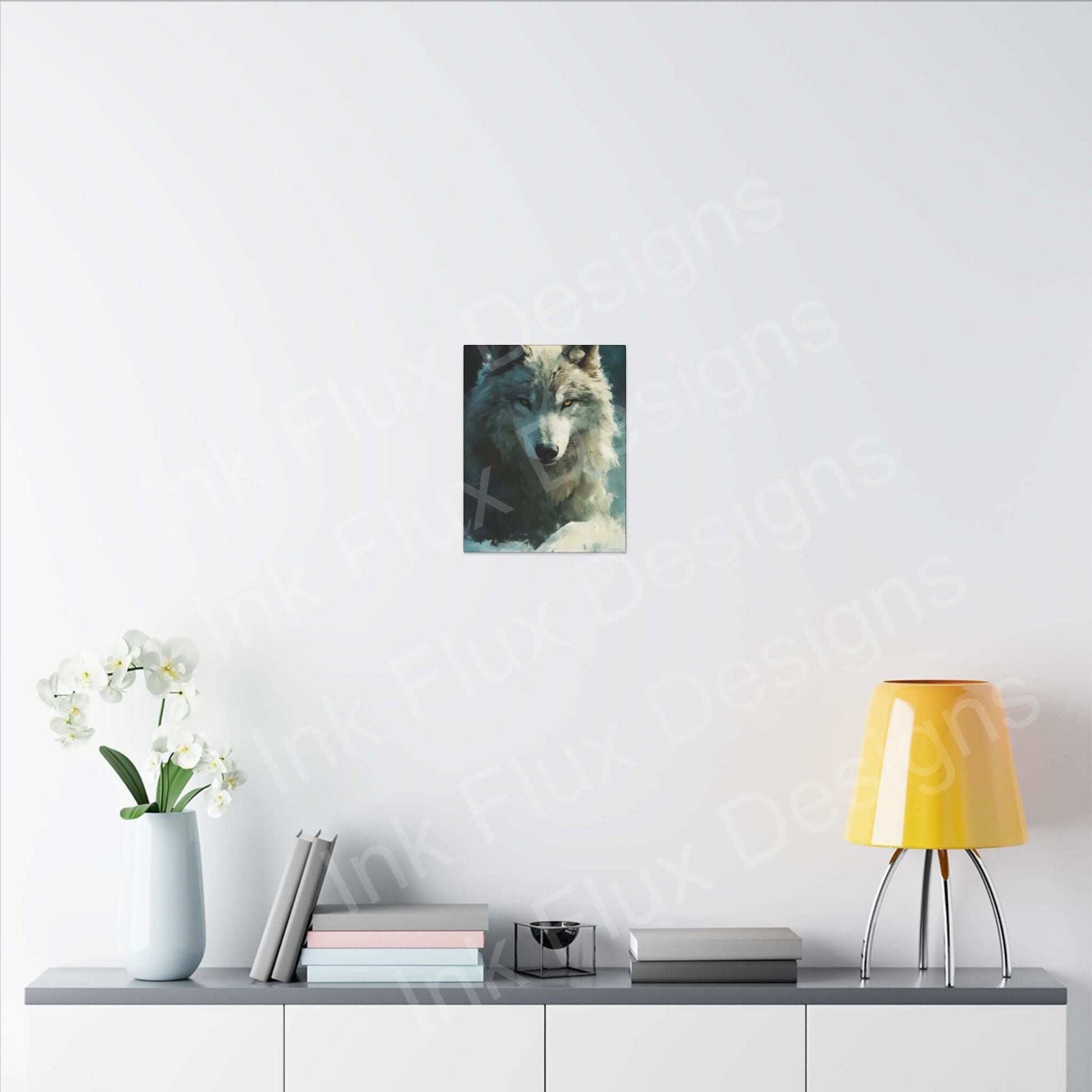 Artic Wolf Matte Canvas artwork displayed on a modern shelf with a yellow lamp and potted flowers by Ink Flux Designs.