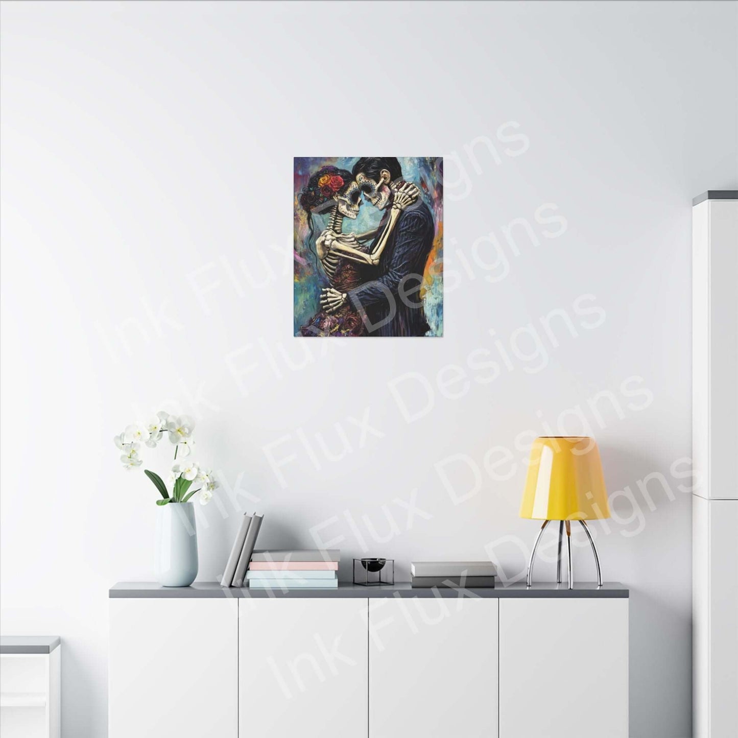 Day of the Dead couple portrait on matte canvas, displayed in modern interior by Ink Flux Designs.