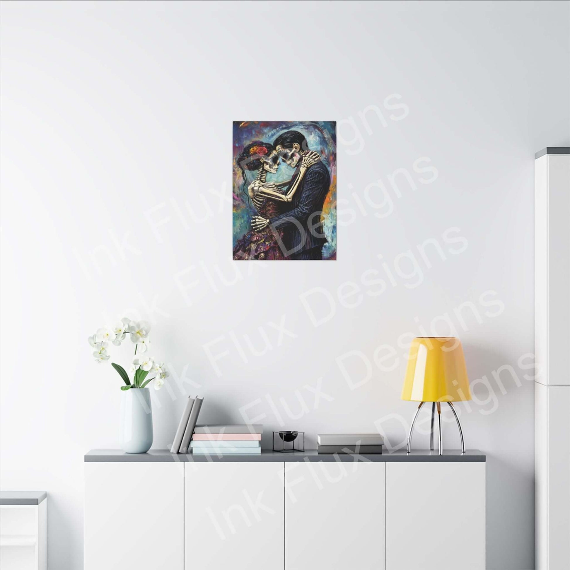 Day of the Dead couple portrait on matte canvas by Ink Flux Designs, stylishly displayed in a contemporary home setting.