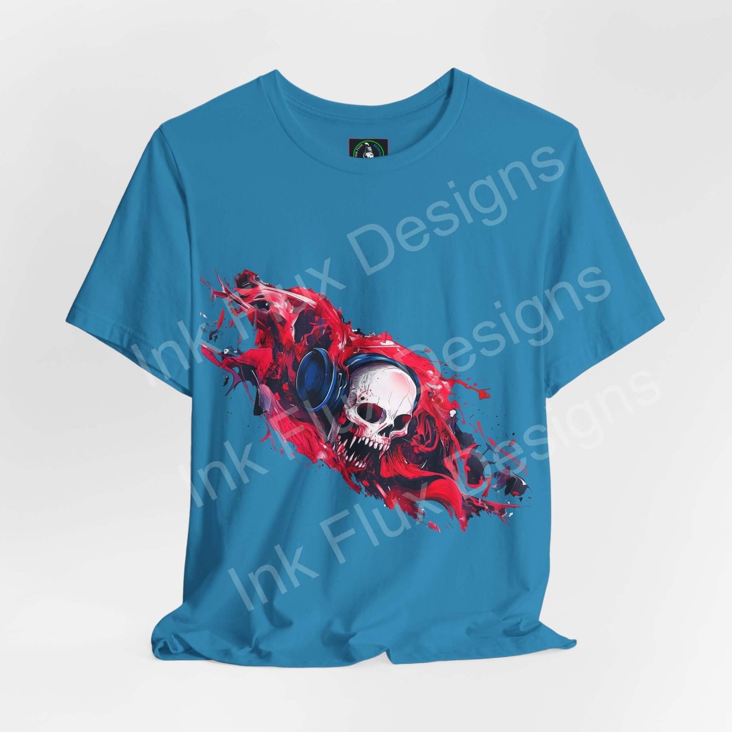 Blue T-shirt featuring a striking skull design by Ink Flux Designs, perfect for style and comfort.