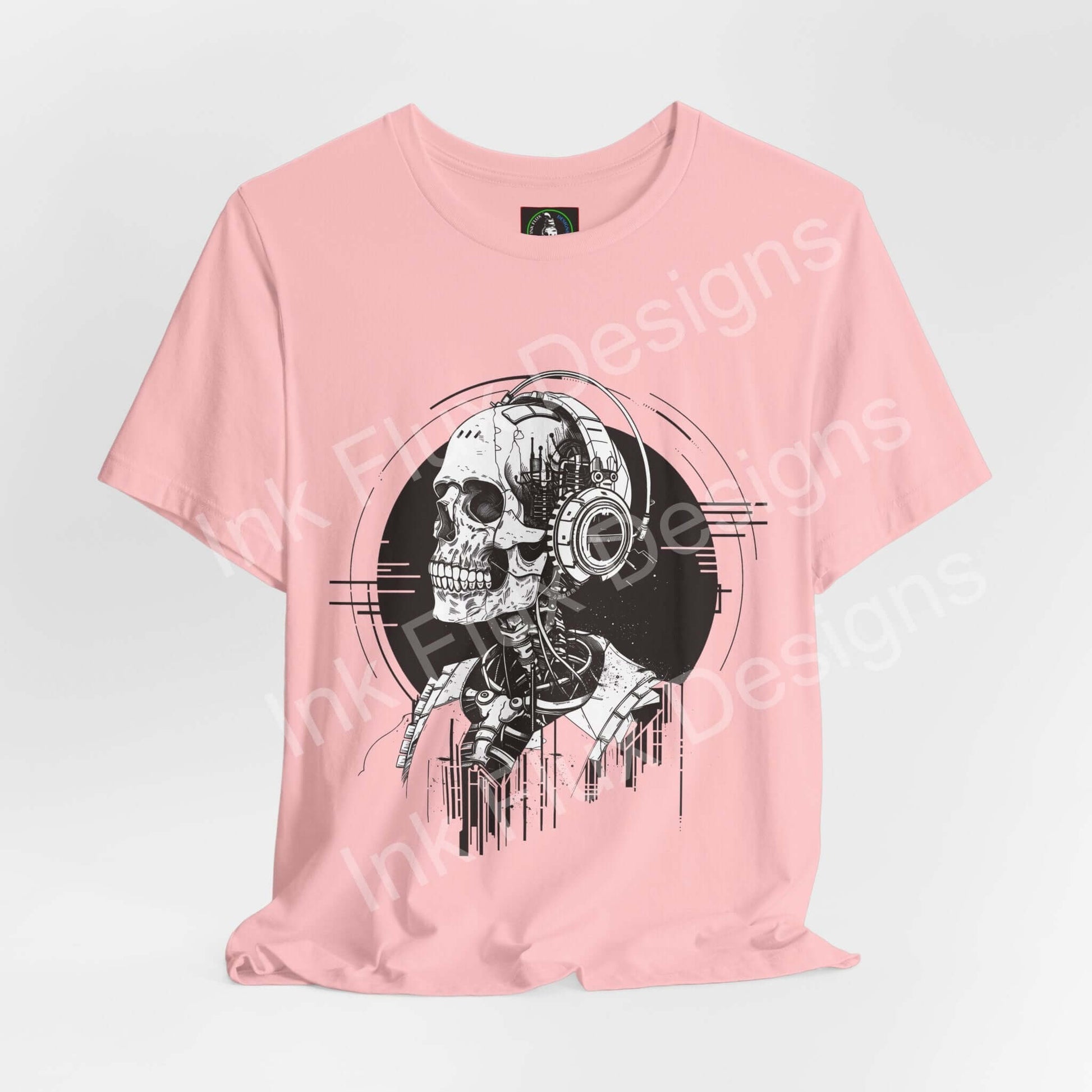 Music skull t-shirt featuring a graphic of a skull with headphones on a pink background by Ink Flux Designs.