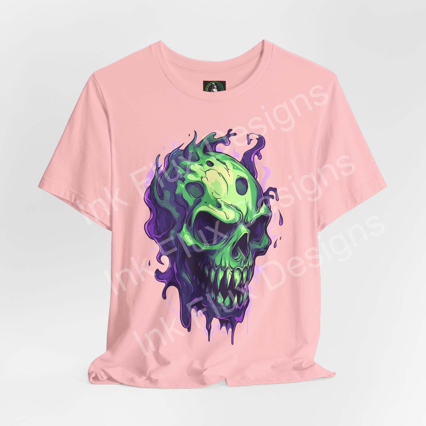 Ethereal melting skull graphic T-shirt by Ink Flux Designs, featuring vibrant colors on a soft pink jersey tee.