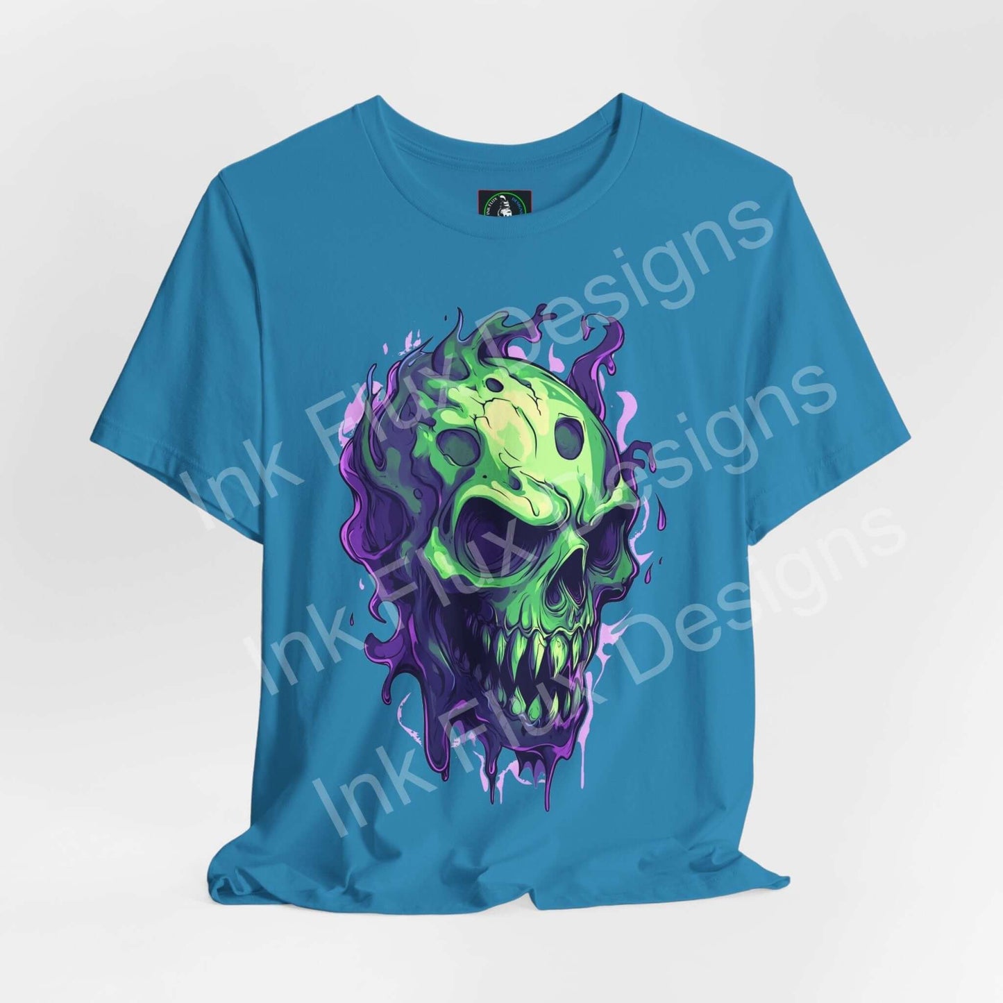 Ethereal melting skull design on a vibrant blue unisex T-shirt by Ink Flux Designs, combining comfort and style.