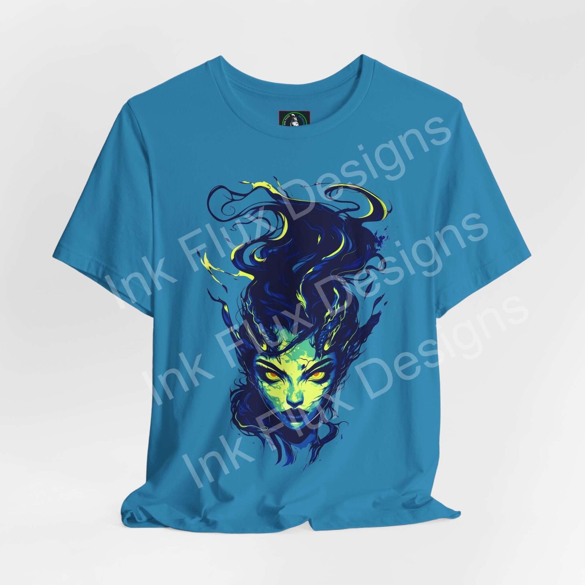 Ethereal Succubus T-Shirt featuring a vibrant design of an ethereal figure on a blue cotton tee from Ink Flux Designs.