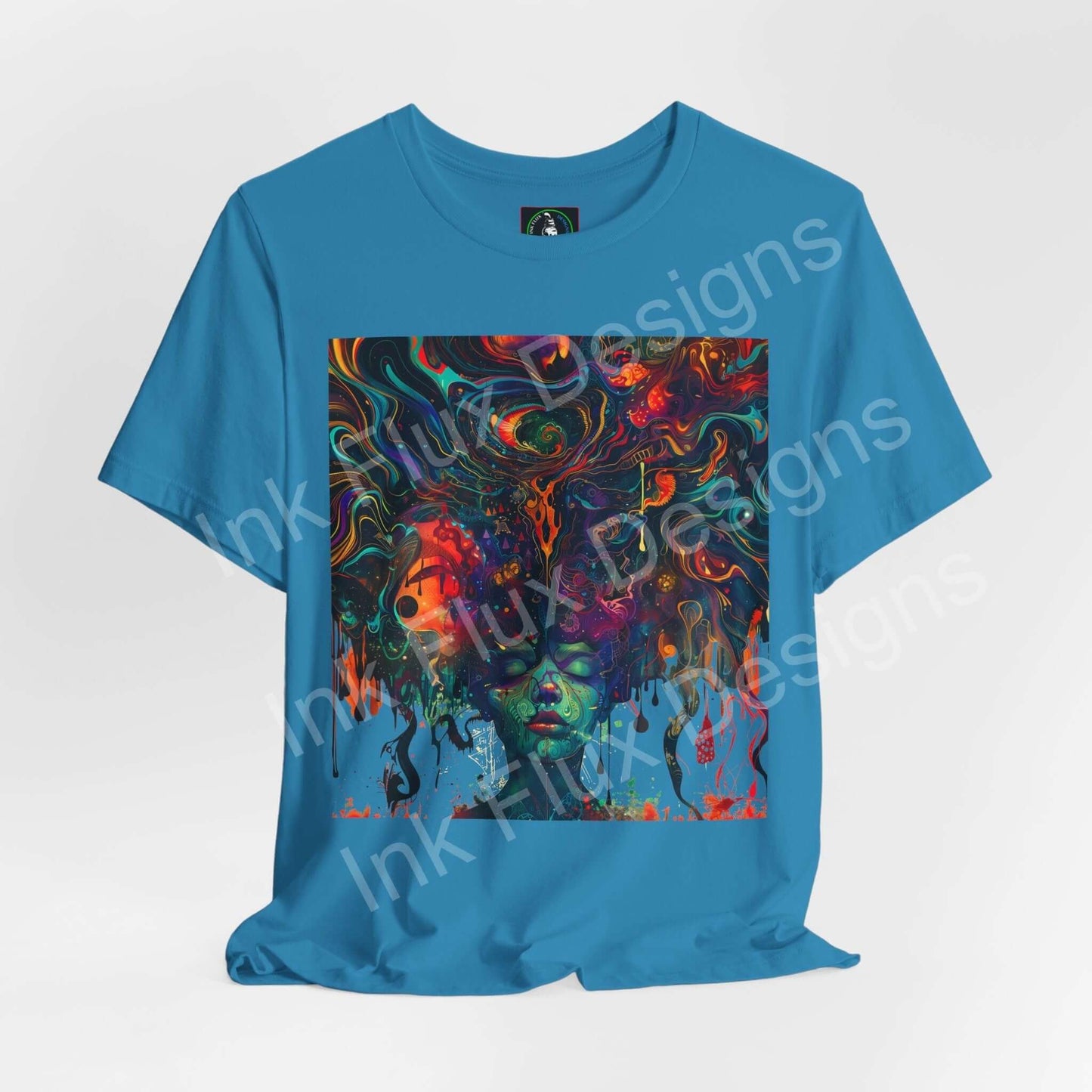 Euphoric Dreamscape II unisex T-shirt by Ink Flux Designs featuring vibrant, colorful artwork on a blue jersey fabric.