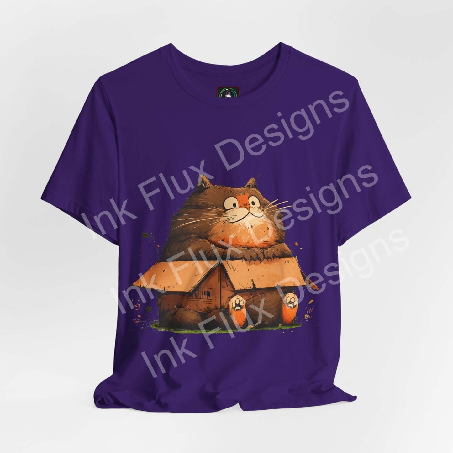 Funny Cat T-Shirt featuring a chunky cat sitting in a box design on a purple shirt.