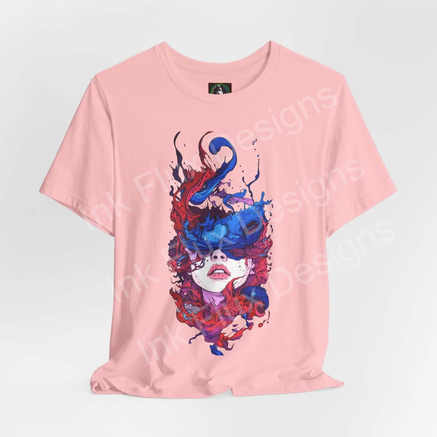 Unisex pink T-shirt featuring colorful art by Ink Flux Designs, showcasing a vibrant, abstract design.