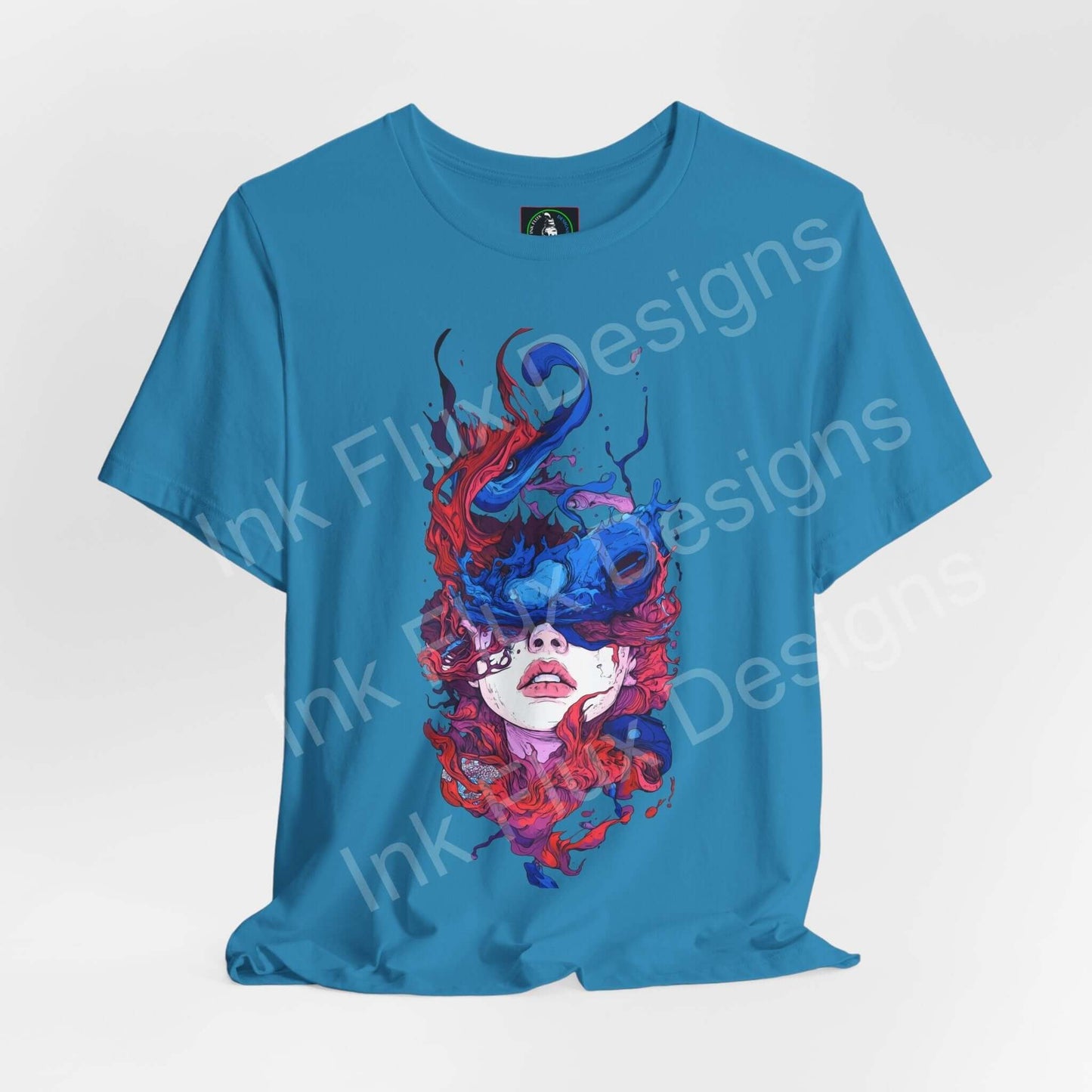 Unisex blue T-shirt featuring vibrant ink artwork by Ink Flux Designs, showcasing a colorful, artistic design.