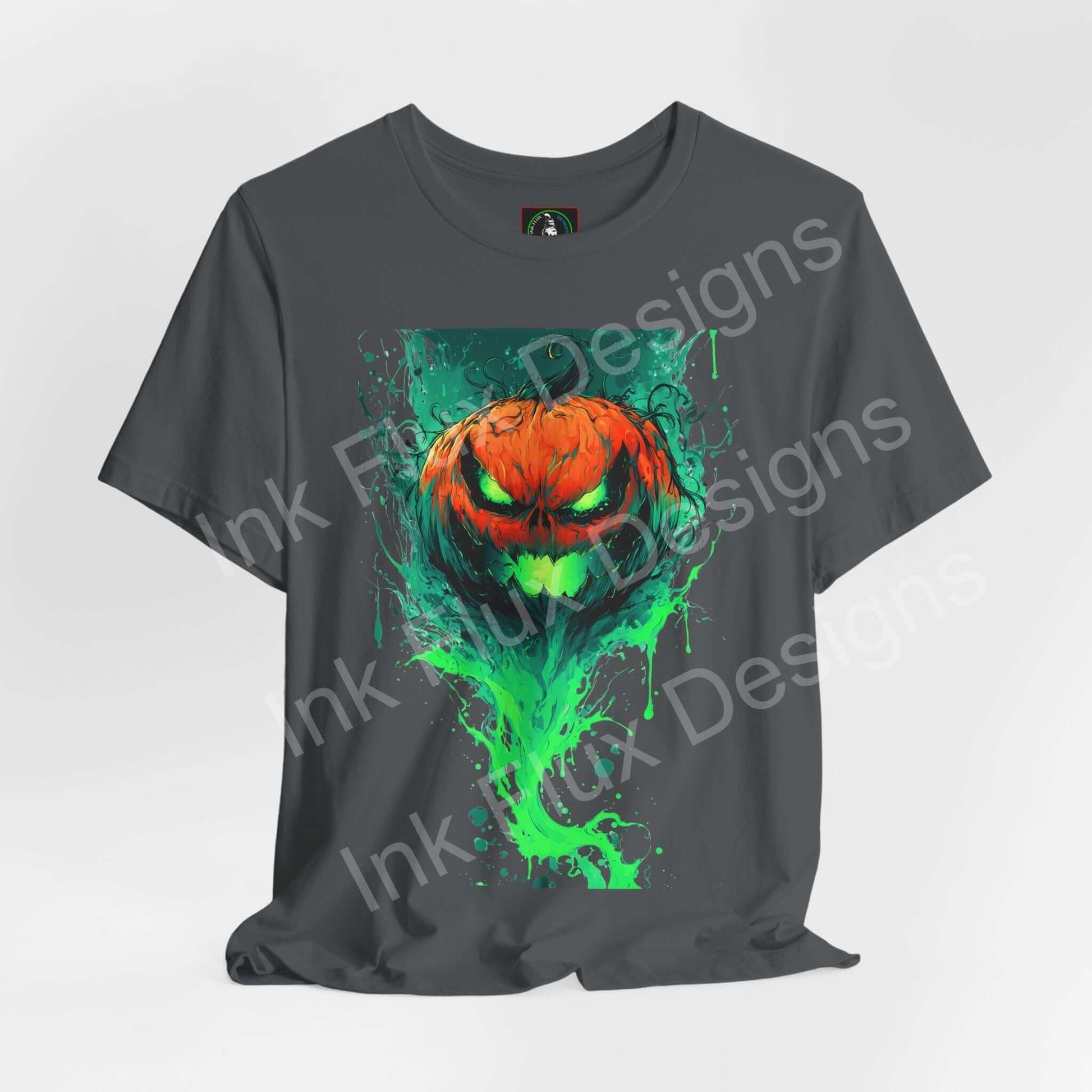 Ink Flux Jack o Lantern 2025 04 graphic t-shirt featuring a vibrant pumpkin design in green and orange.